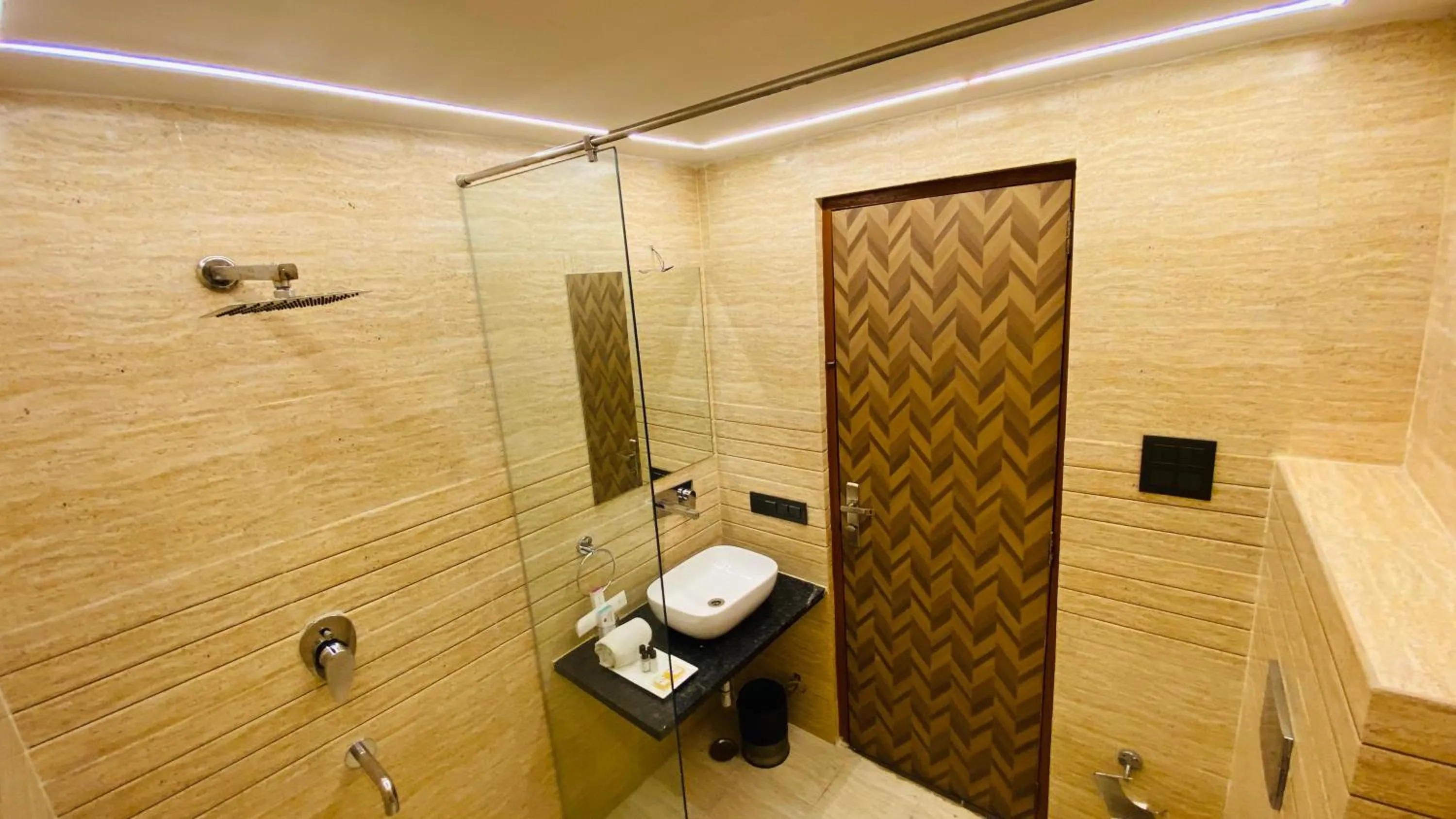 Shower in The Byke Grassfield Resort with Outdoor Pool, Shyam Nagar, Jaipur