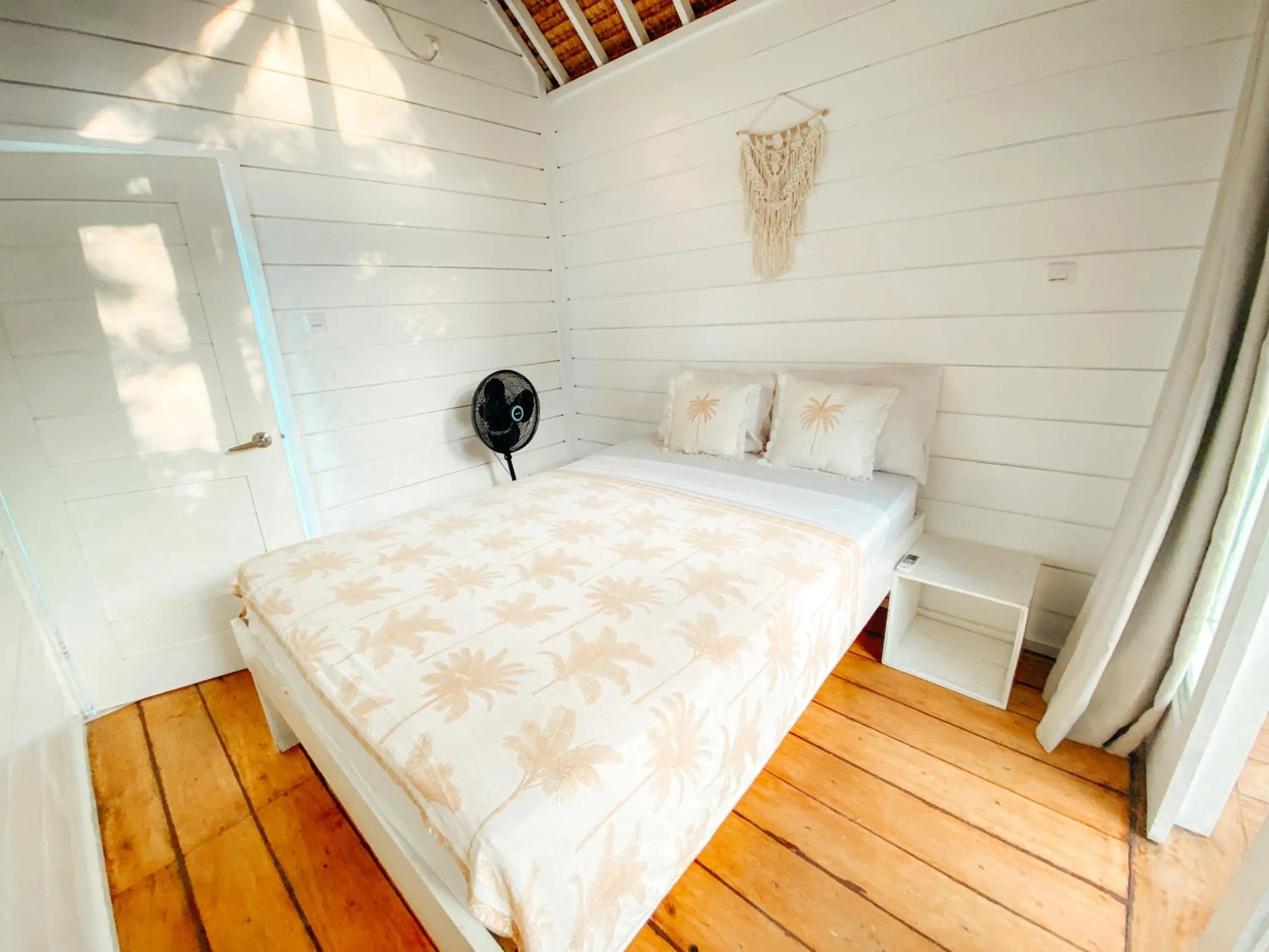 Bed in Love Coconut Bungalow