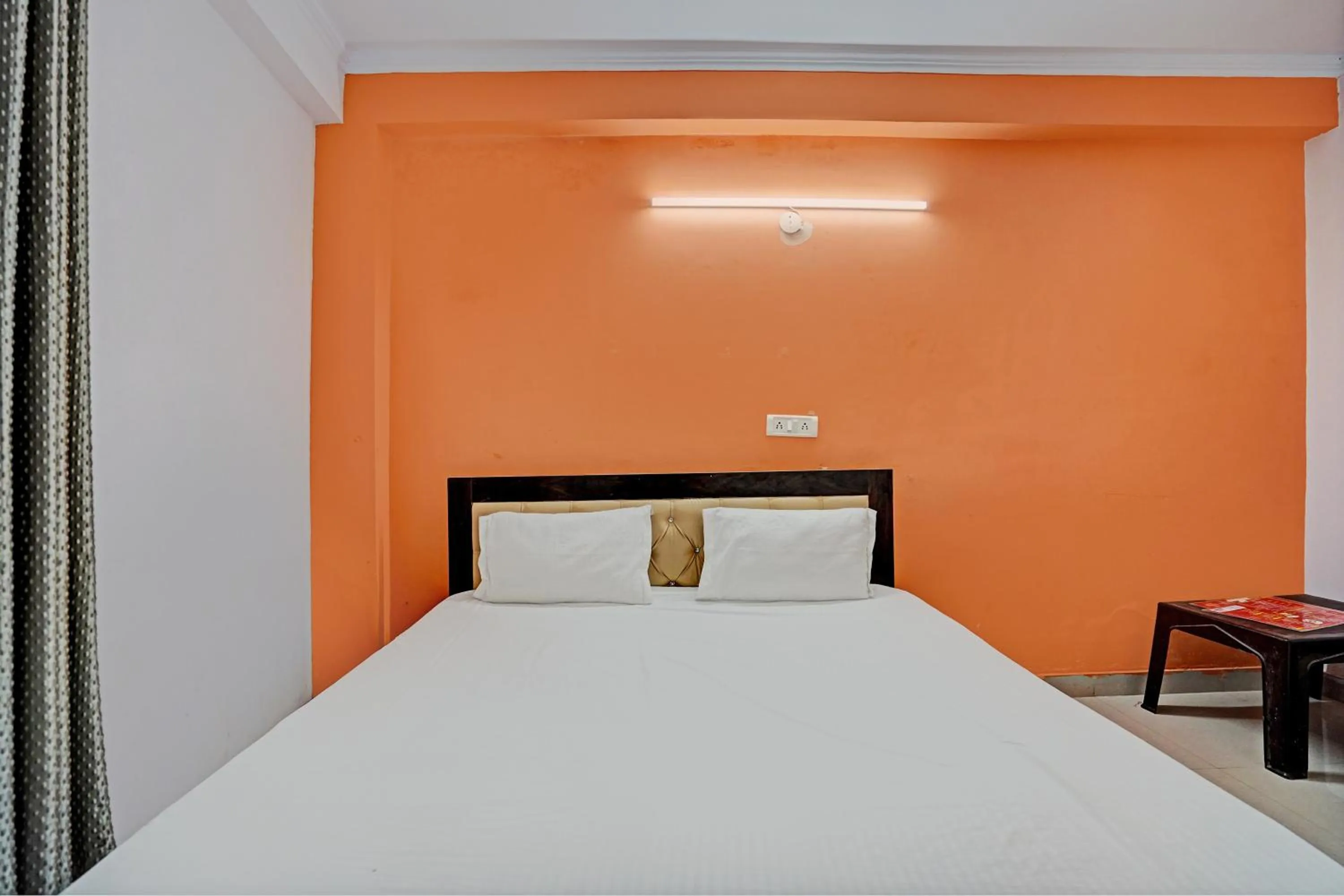 Bedroom in Hotel O Krishna Residency