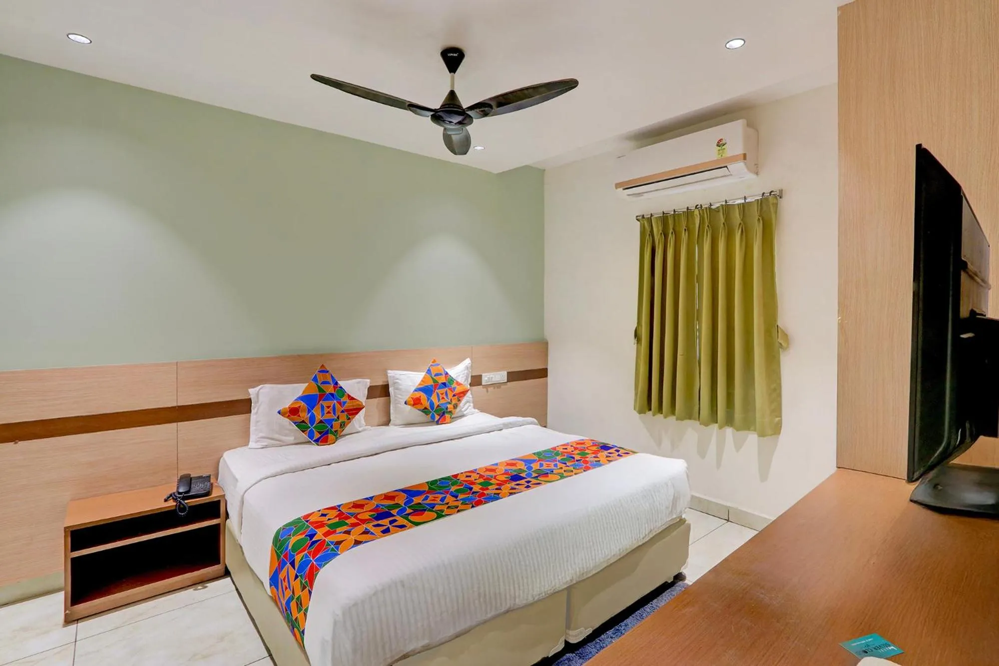 Bed in FabHotel Silver Cloud