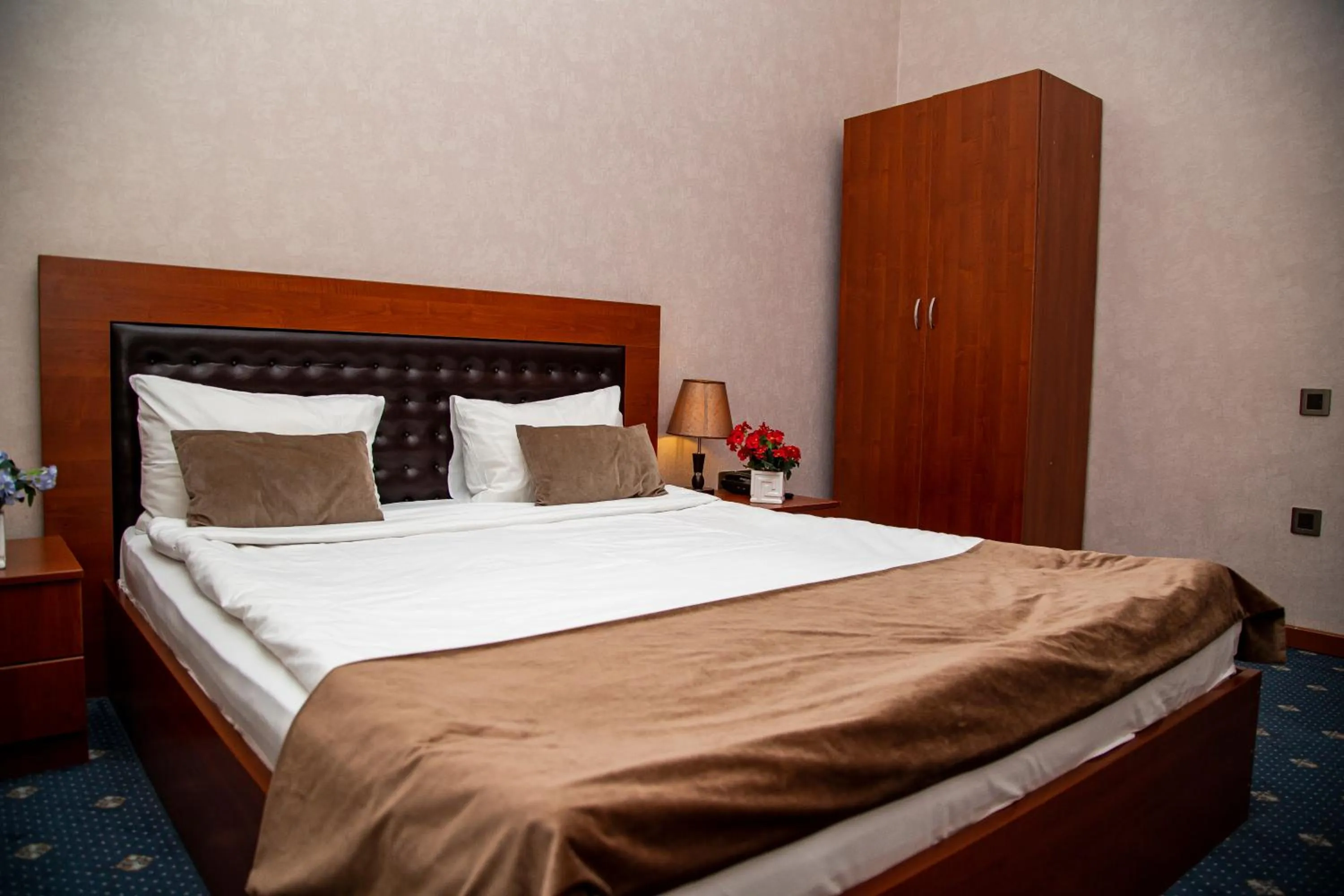 Bed in Du Port Boutique Hotel