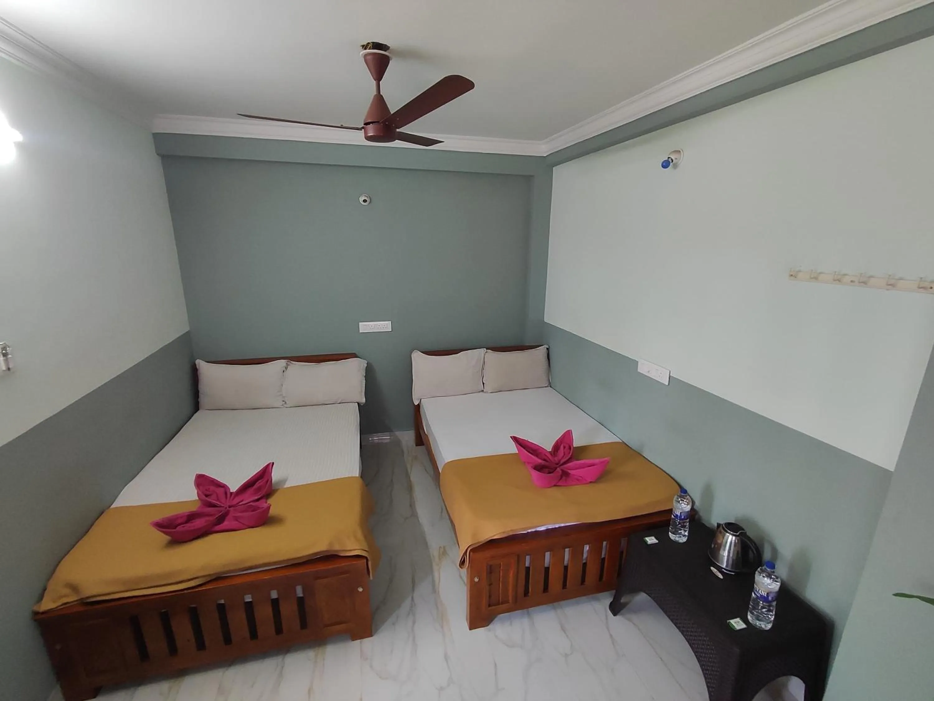 Bed in Sri Aksha Residency