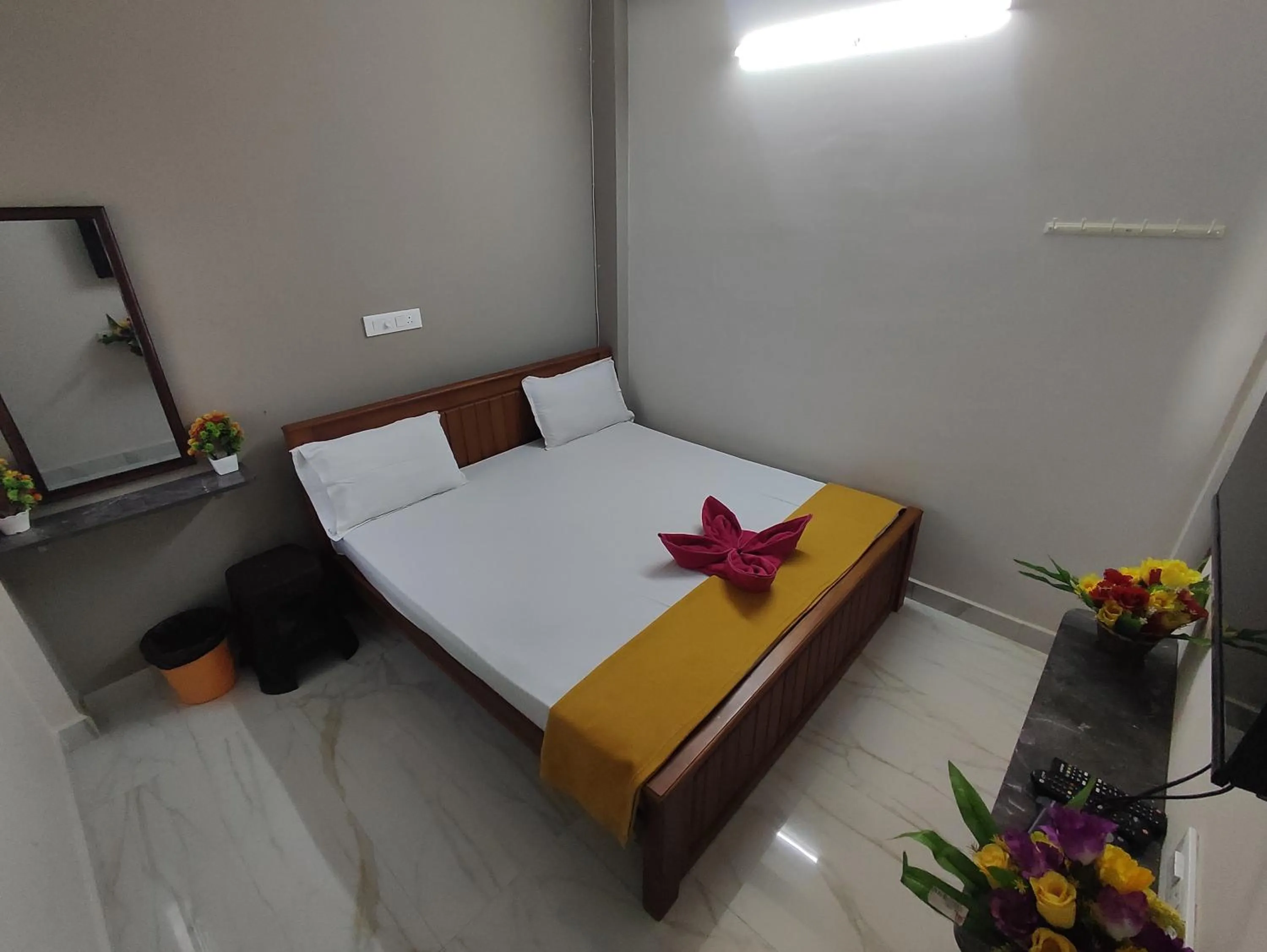 Bed in Sri Aksha Residency