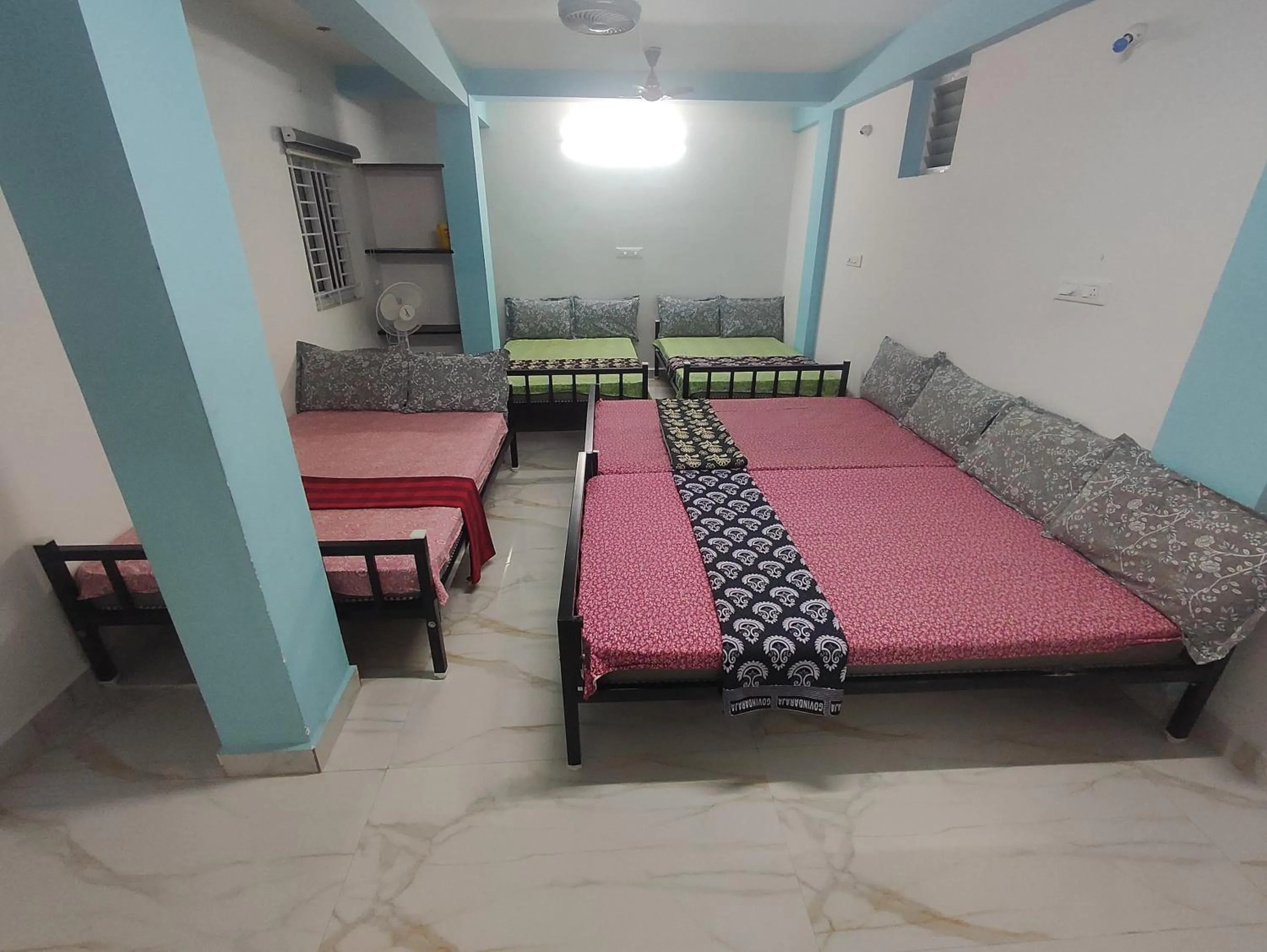 Bed in Sri Aksha Residency