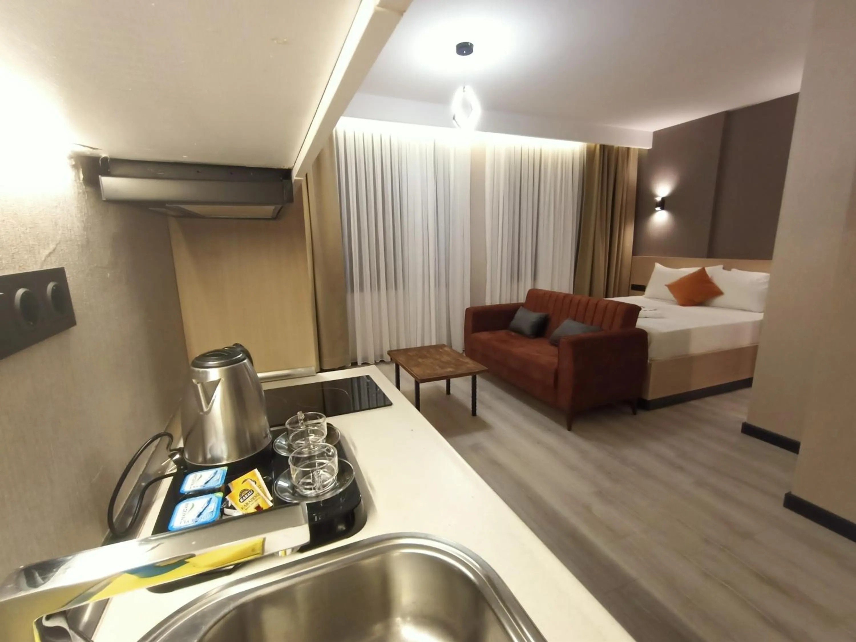 Kitchen or kitchenette, Bed in NEW FALCON Palas OTEL