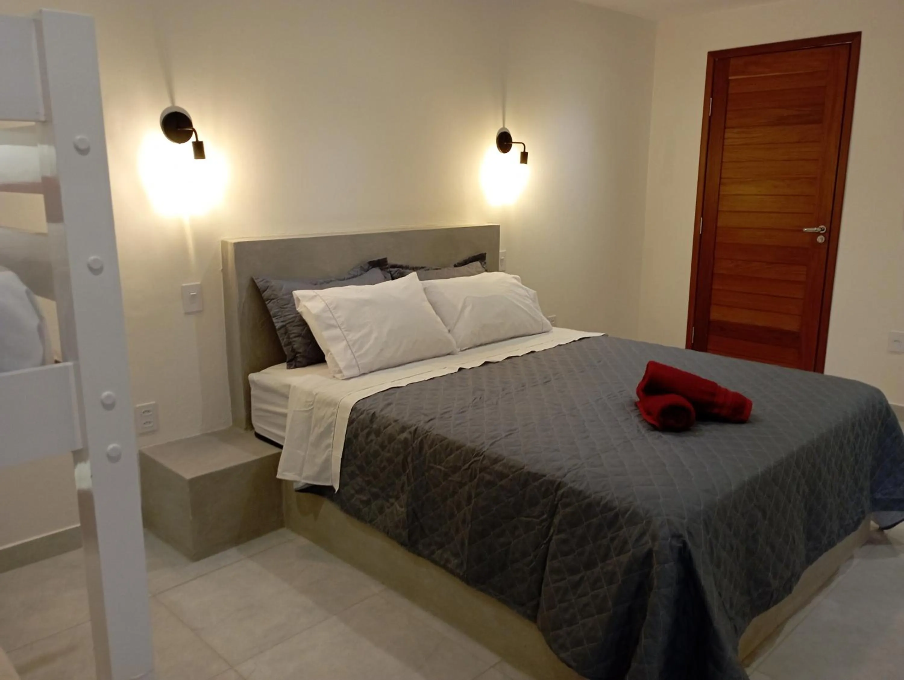 Bed in Pousada Casa Do Cocotier