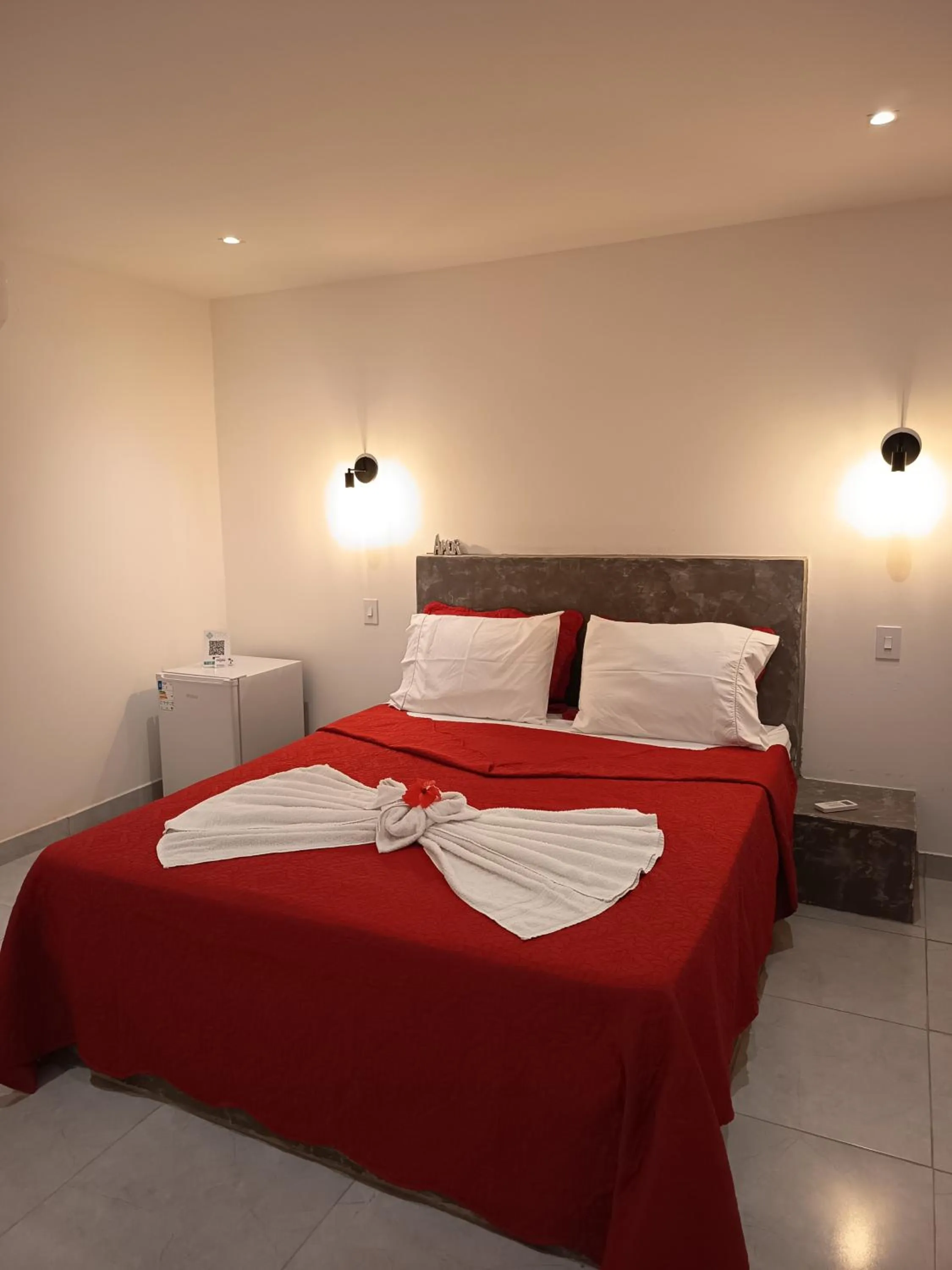 Bed in Pousada Casa Do Cocotier