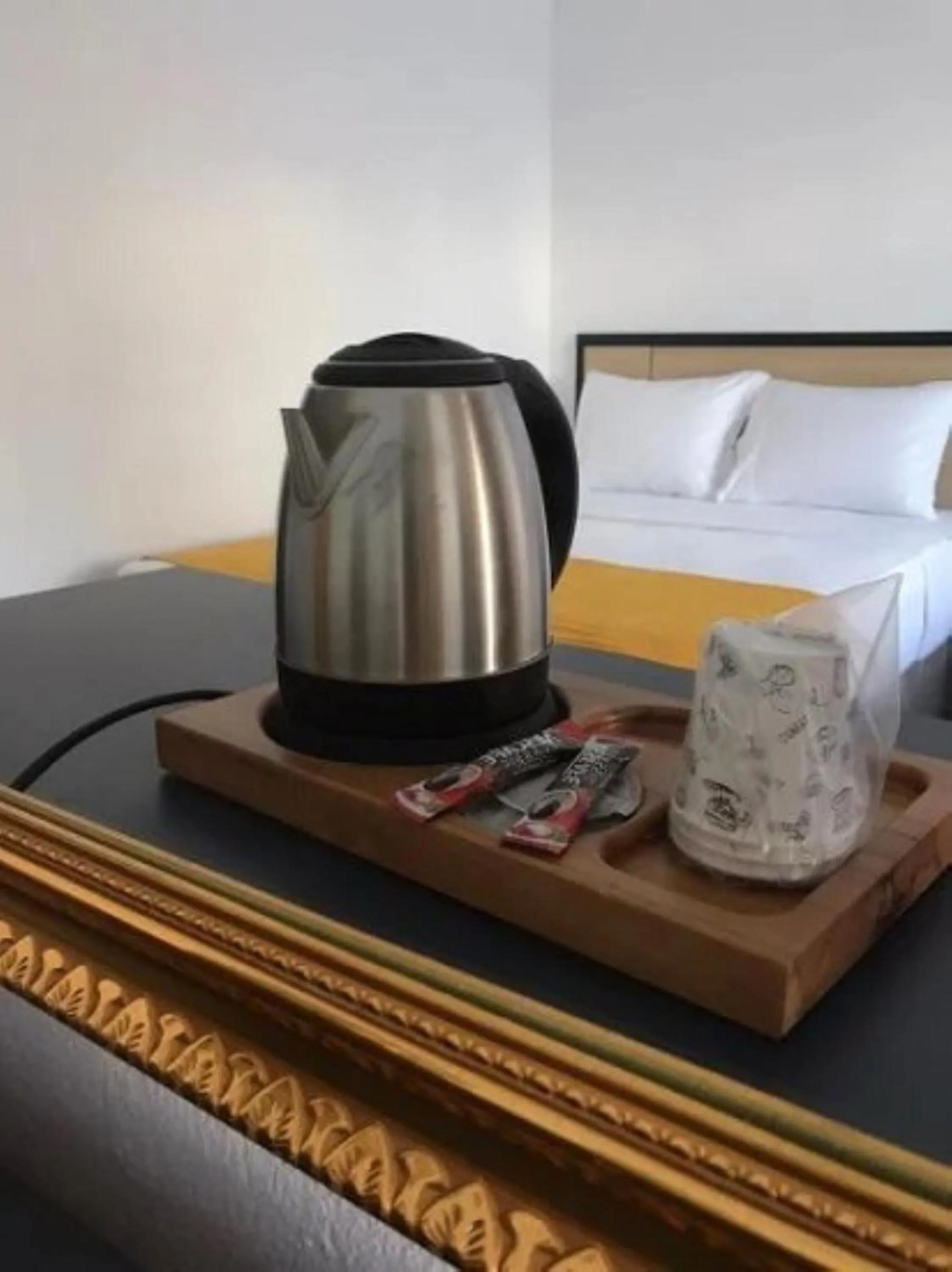Coffee/tea facilities, Bed in Bali Star City Hotel