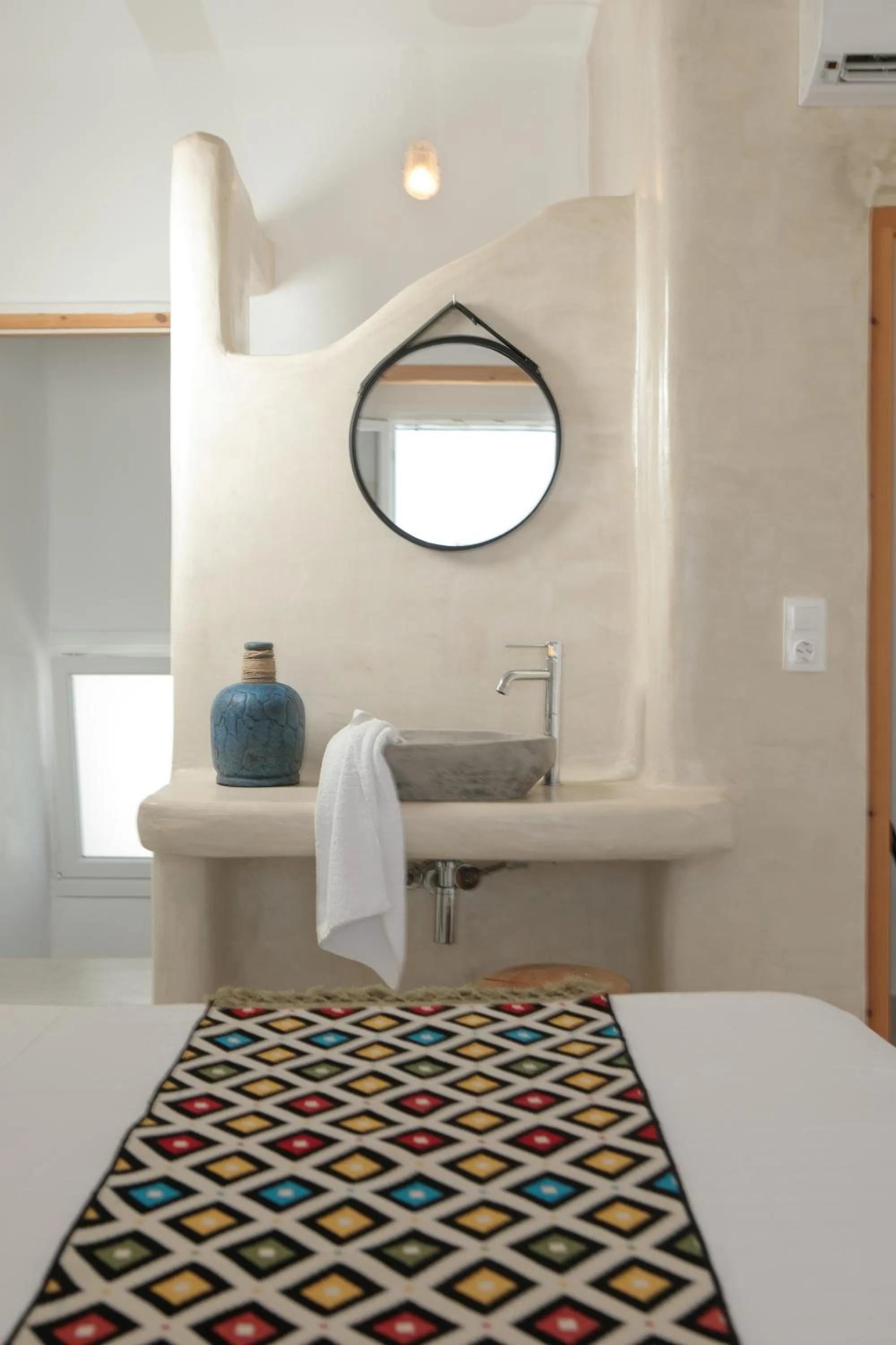 Bed in Irida Vacation Suites