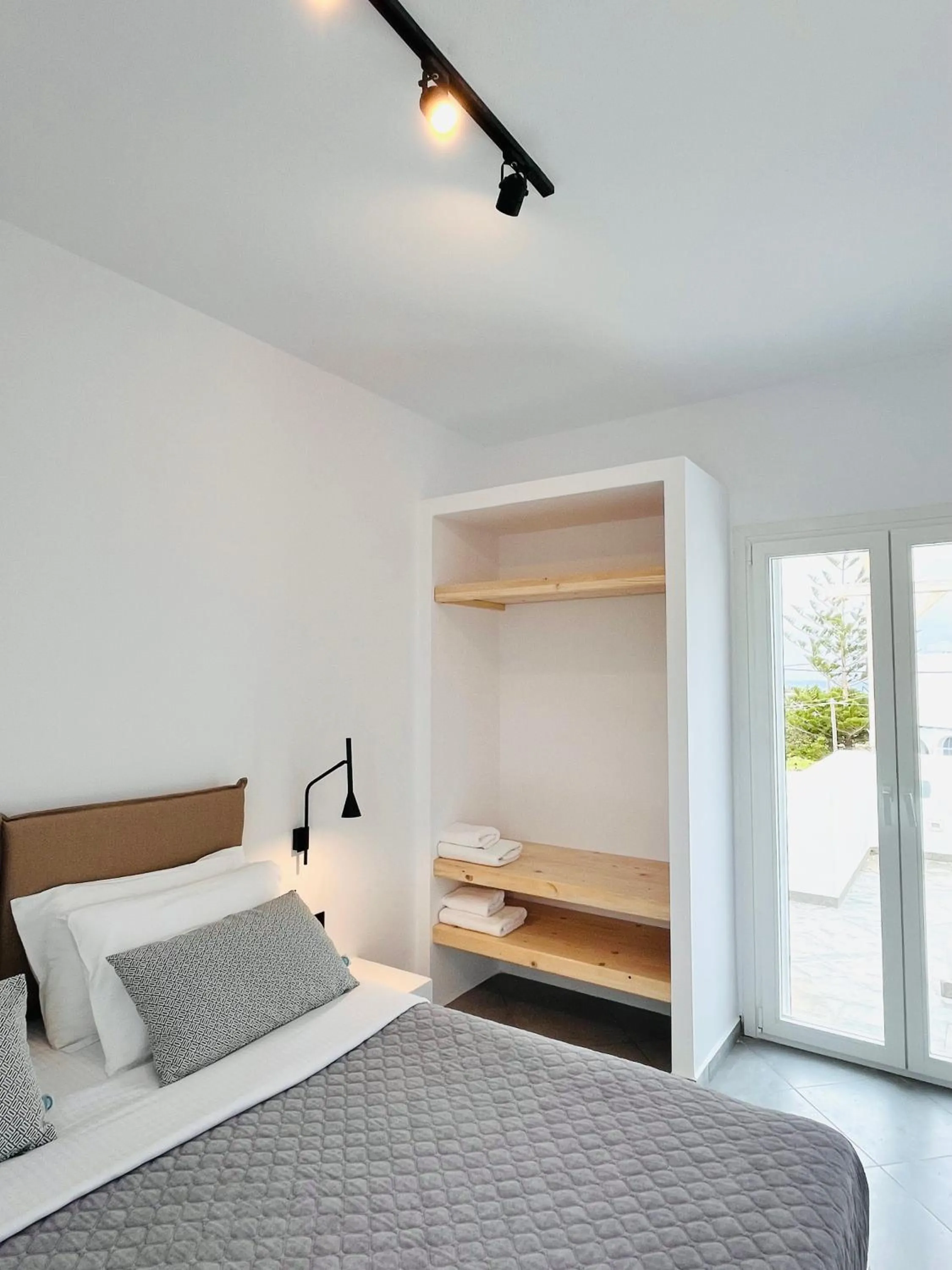Bed in Irida Vacation Suites
