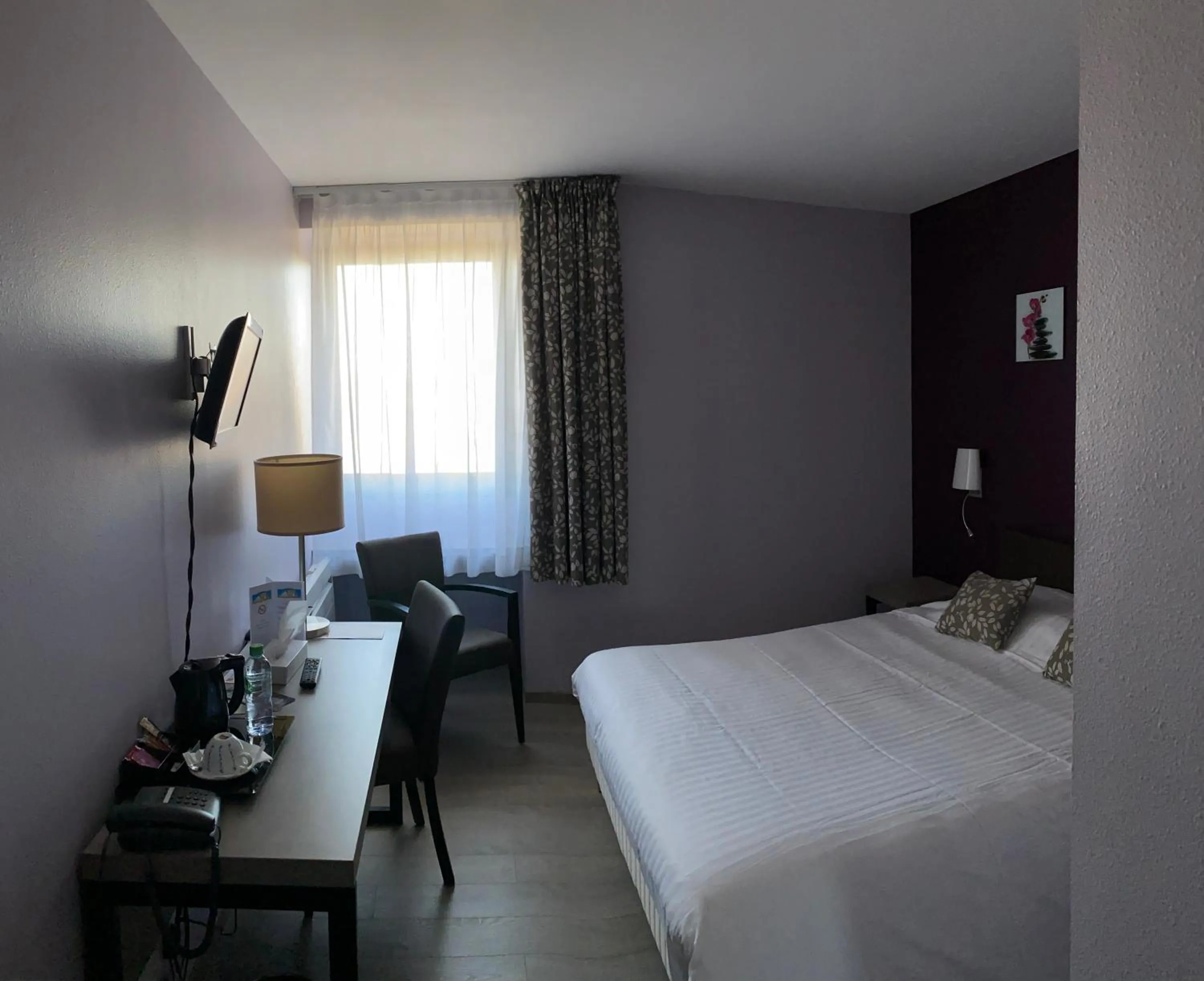 Decorative detail, Bed in Cit'Hotel LA PYRAMIDE