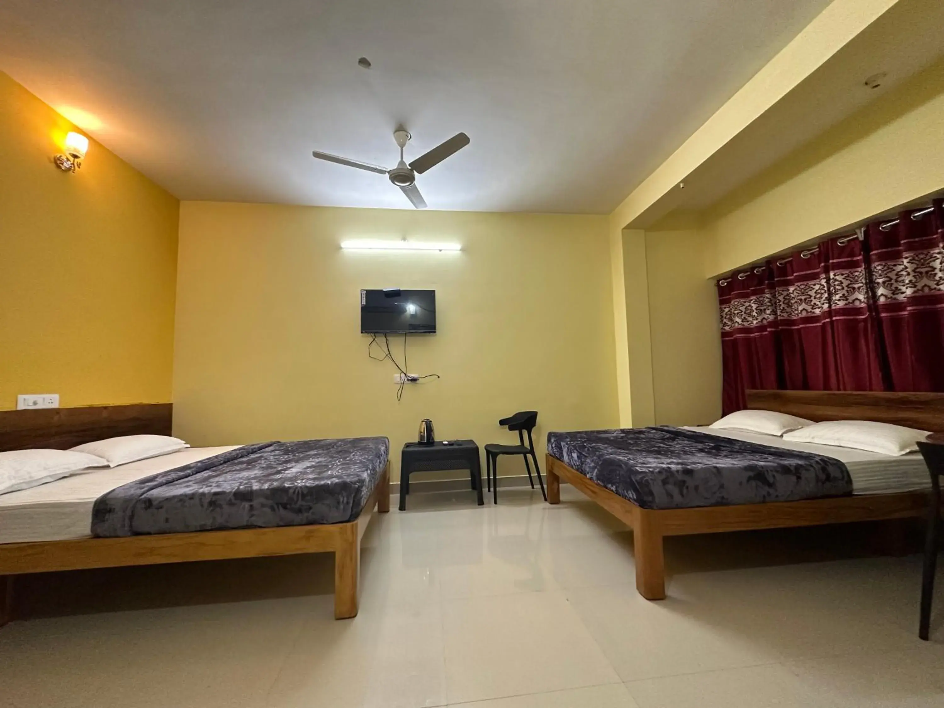 Photo of the whole room, Bed in The Kaya Inn Srirangam Photo of the whole room, Bed in The Kaya Inn Srirangam