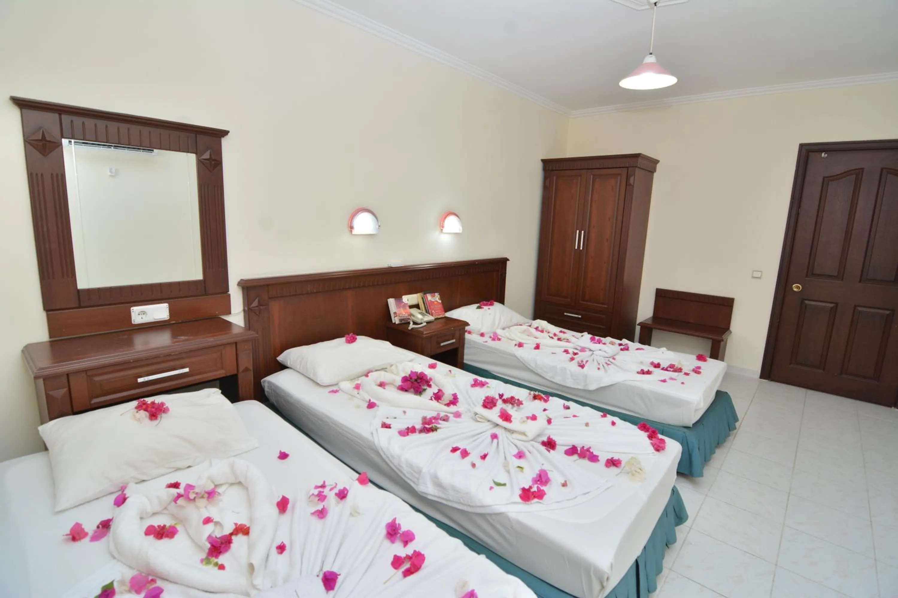 Bed in Rose Garden Apart Hotel