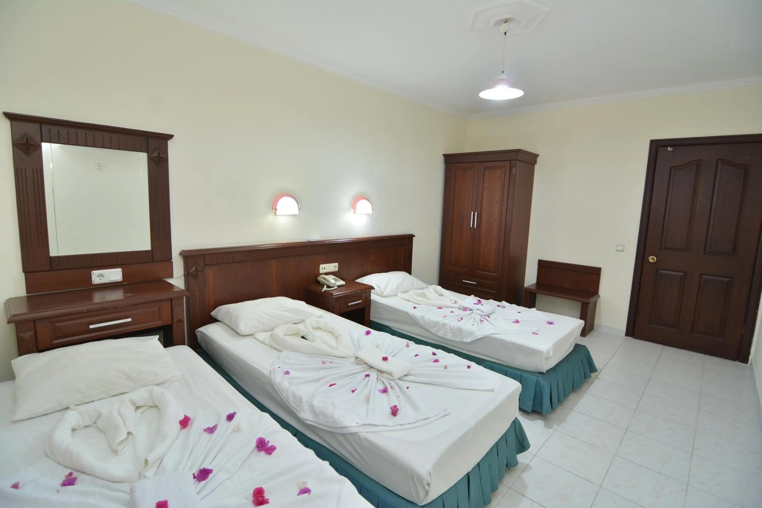 Bed in Rose Garden Apart Hotel