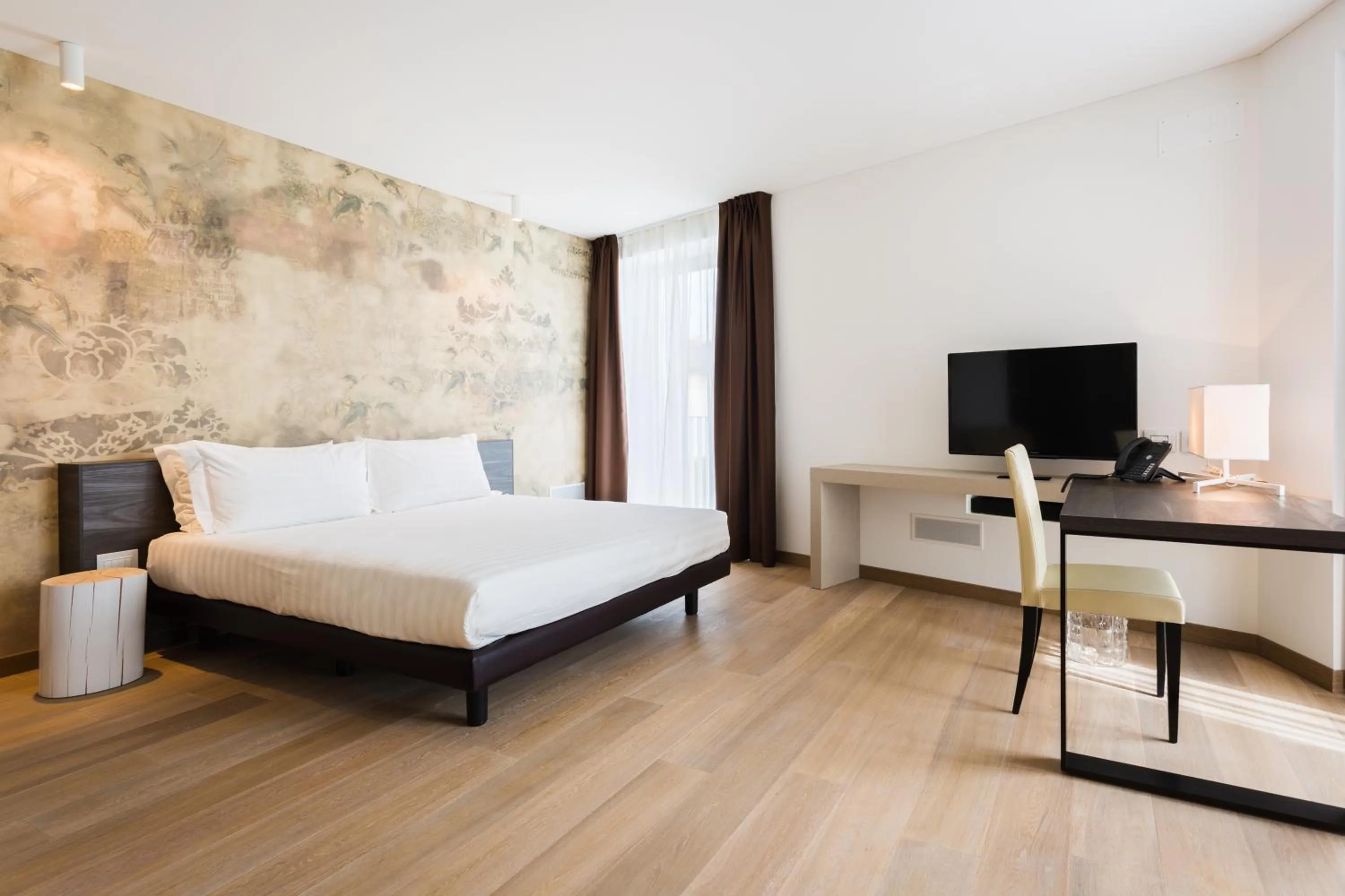 Bed in Suites Hotel Astor