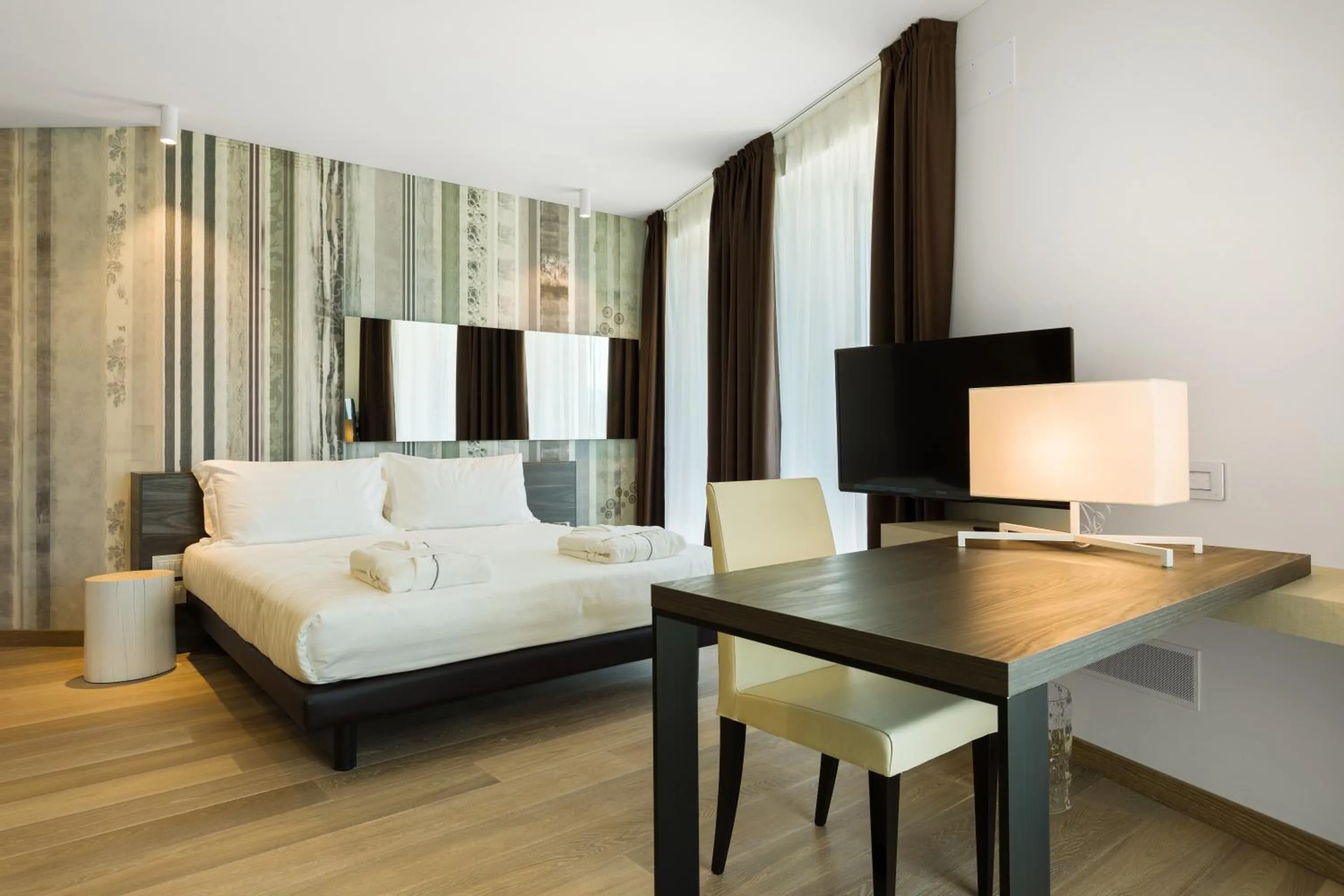 Bed in Suites Hotel Astor