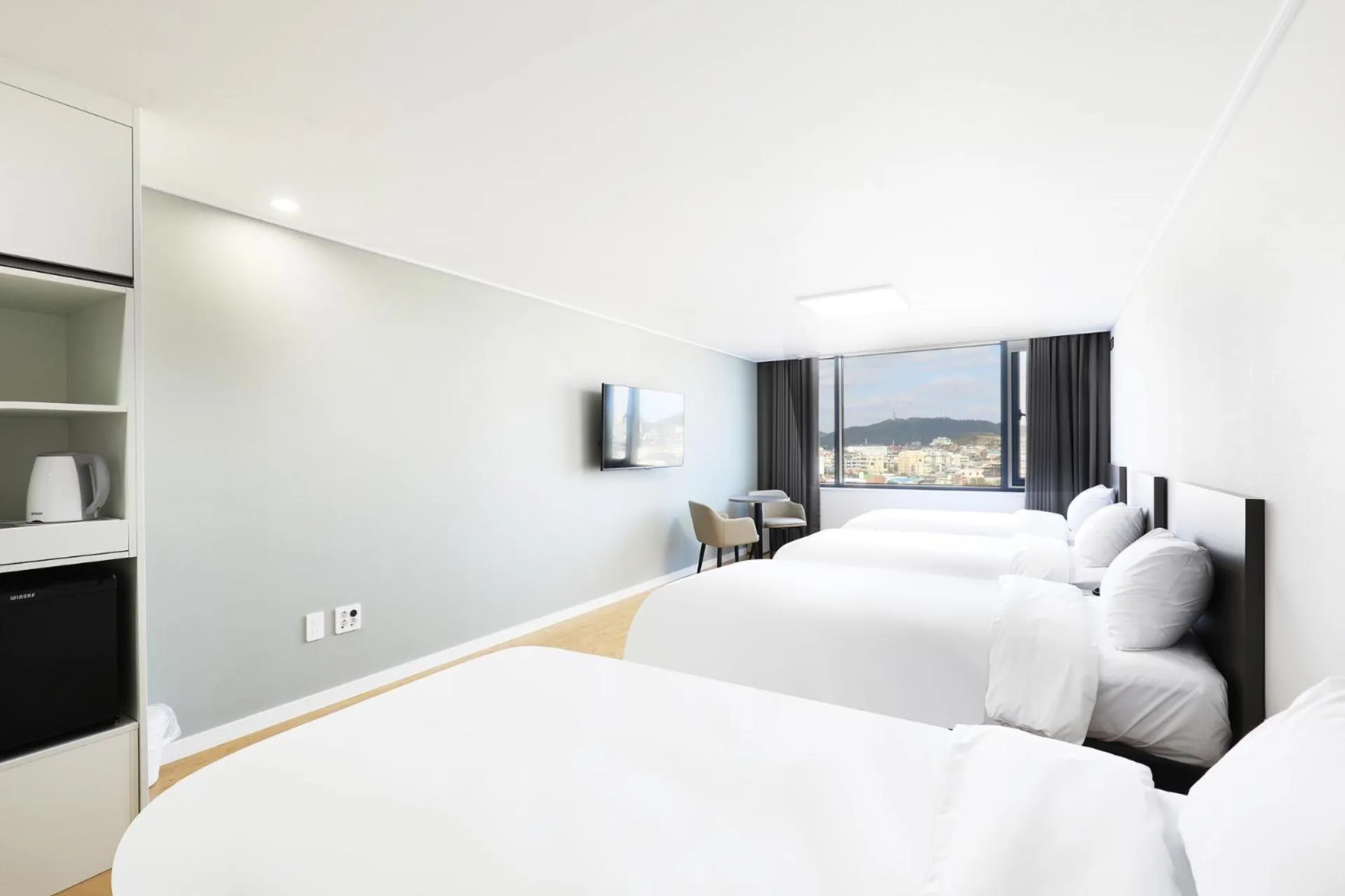 Bed in Mokpo Ocean Hotel