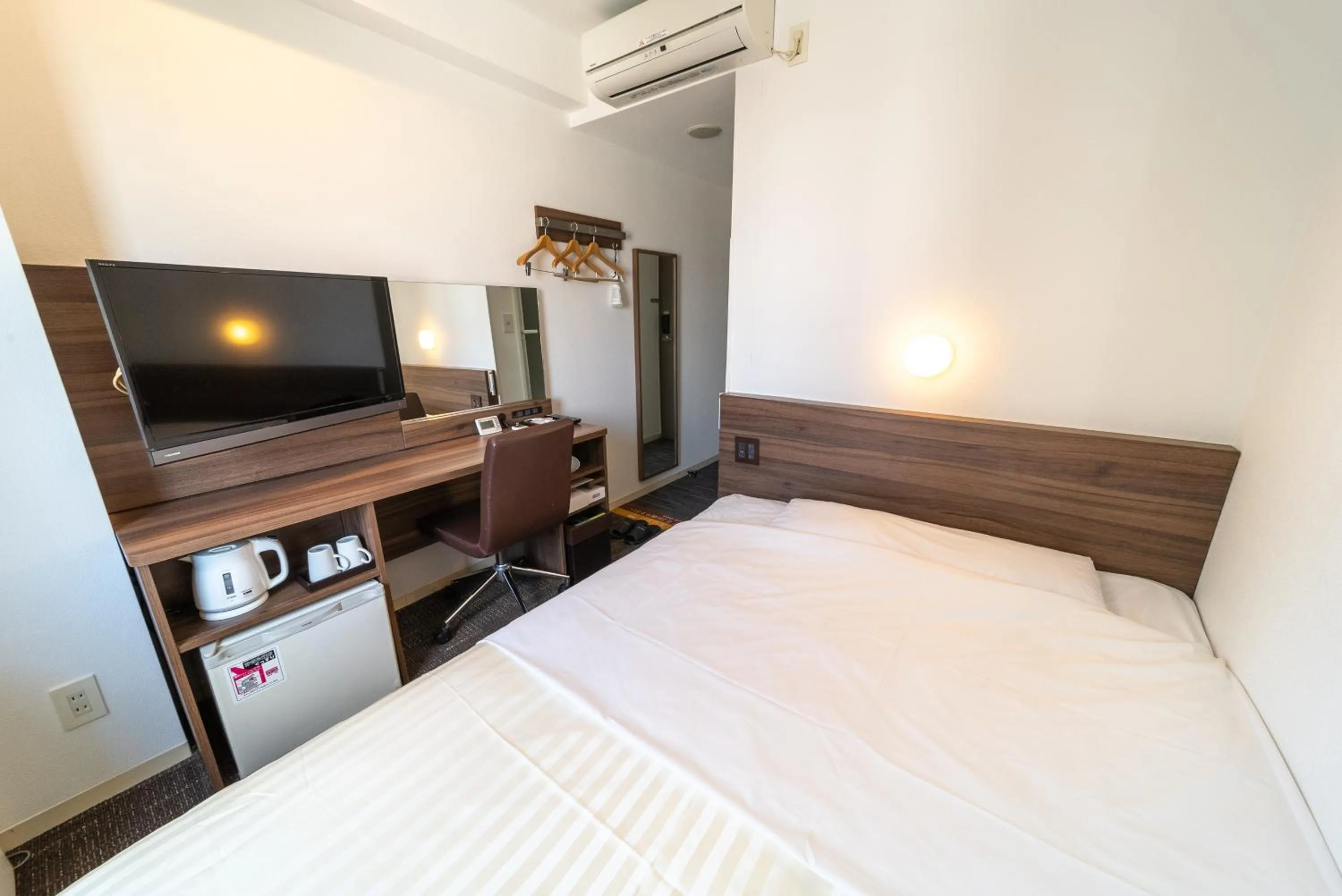 Bed in Super Hotel Tokyo JR Tachikawa Kitaguchi