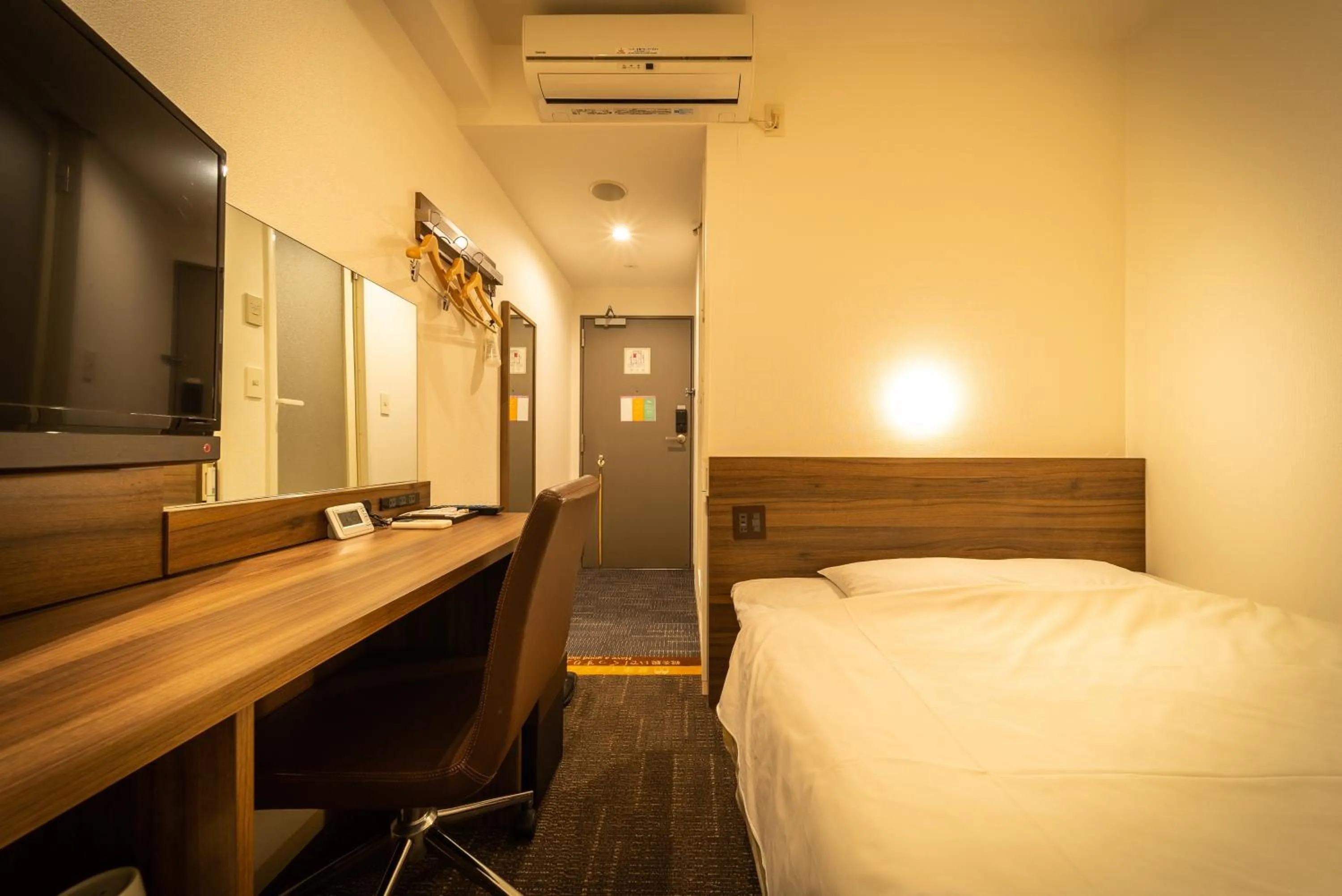 Bed in Super Hotel Tokyo JR Tachikawa Kitaguchi