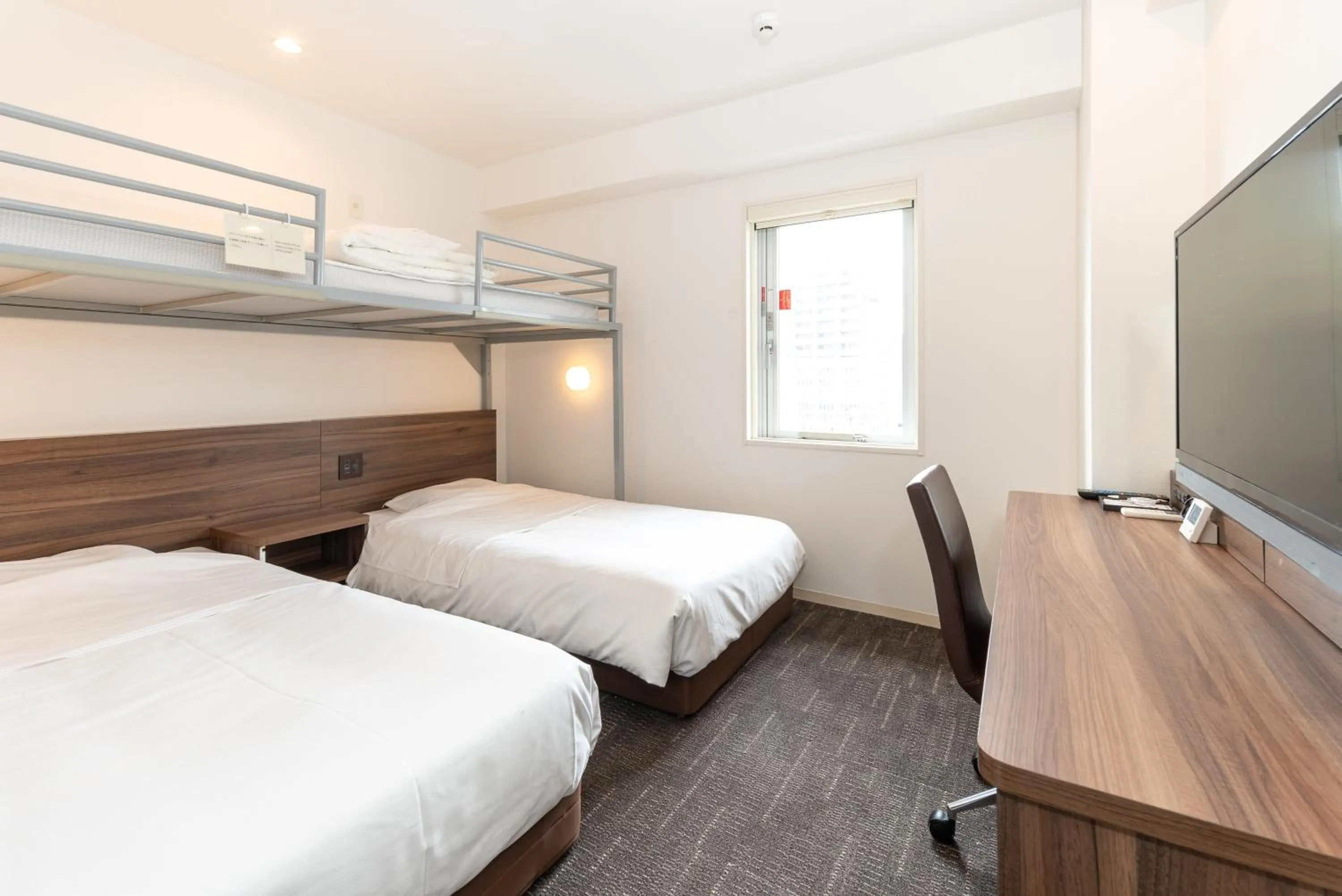 Bed in Super Hotel Tokyo JR Tachikawa Kitaguchi