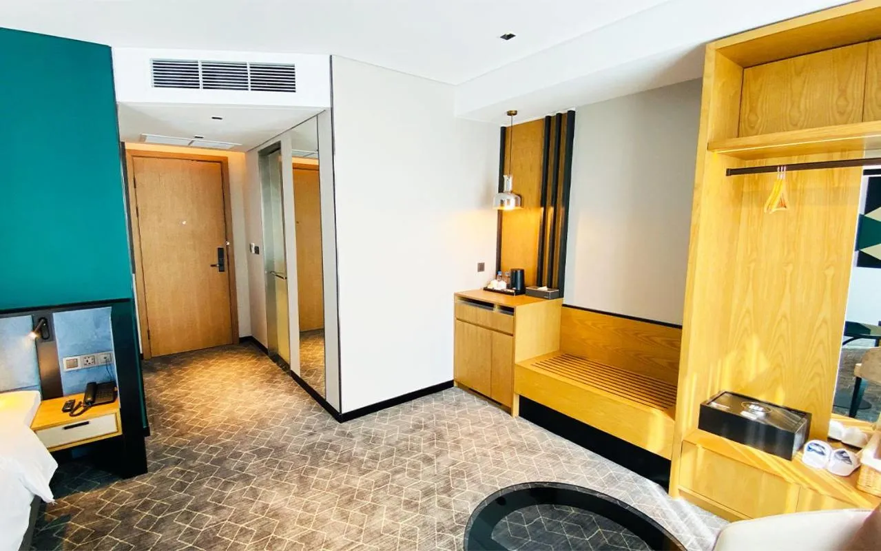 Seating area, Bed in SIHA Hotel & Casino