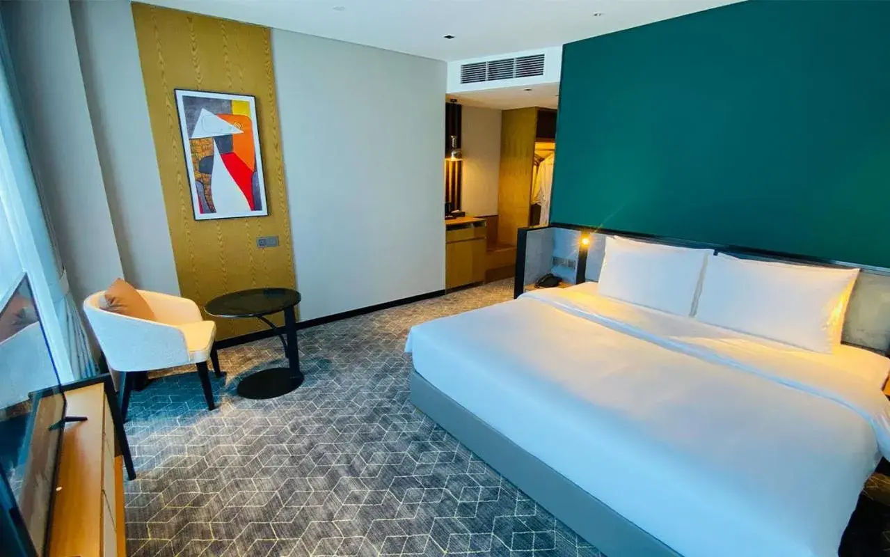 Bed in SIHA Hotel & Casino Bed in SIHA Hotel & Casino