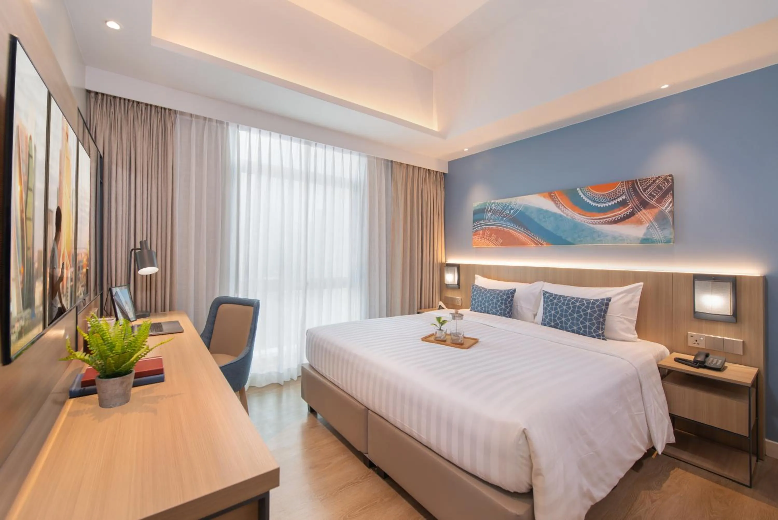 Bed in Citadines Roces Quezon City