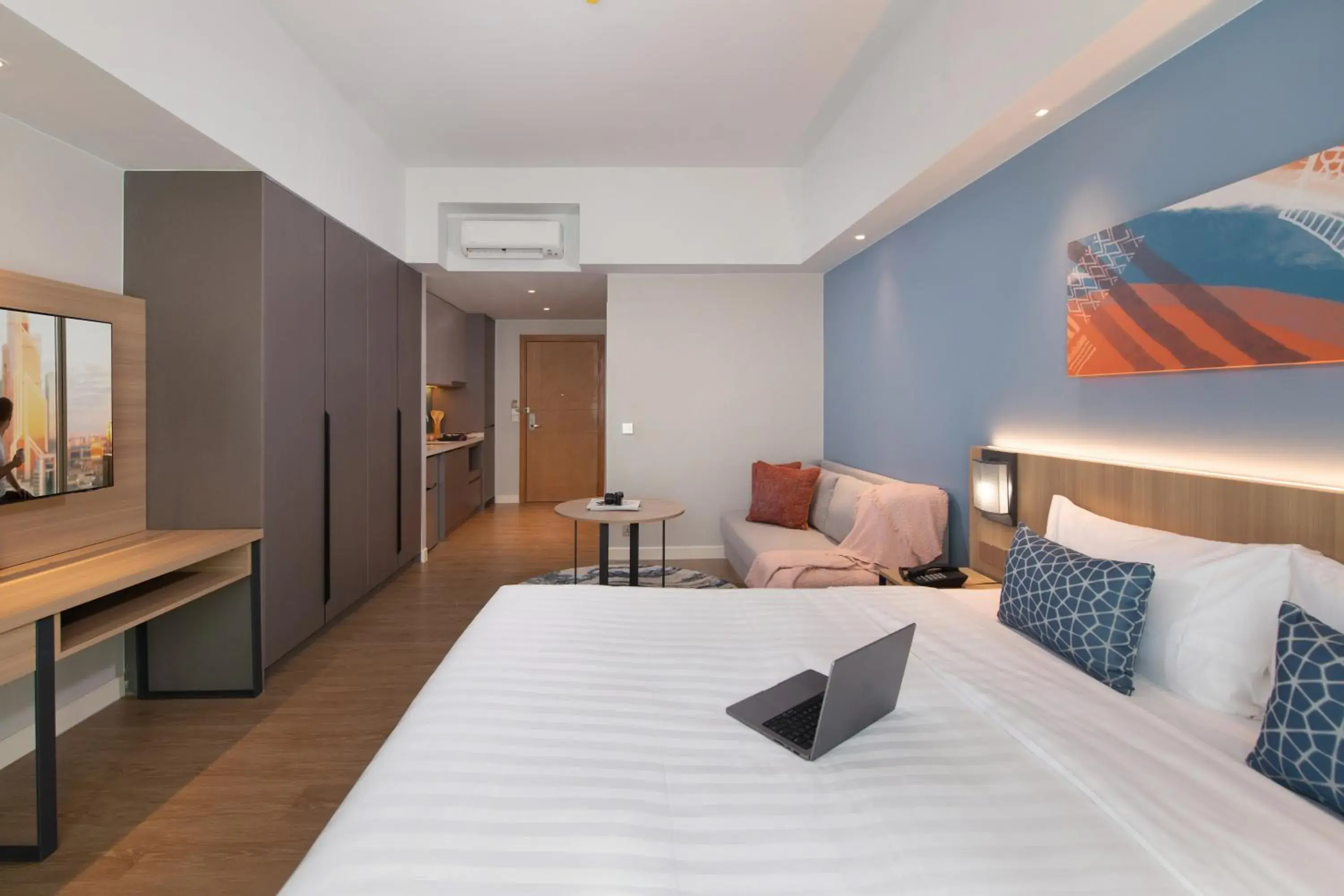 Seating area, Bed in Citadines Roces Quezon City Seating area, Bed in Citadines Roces Quezon City