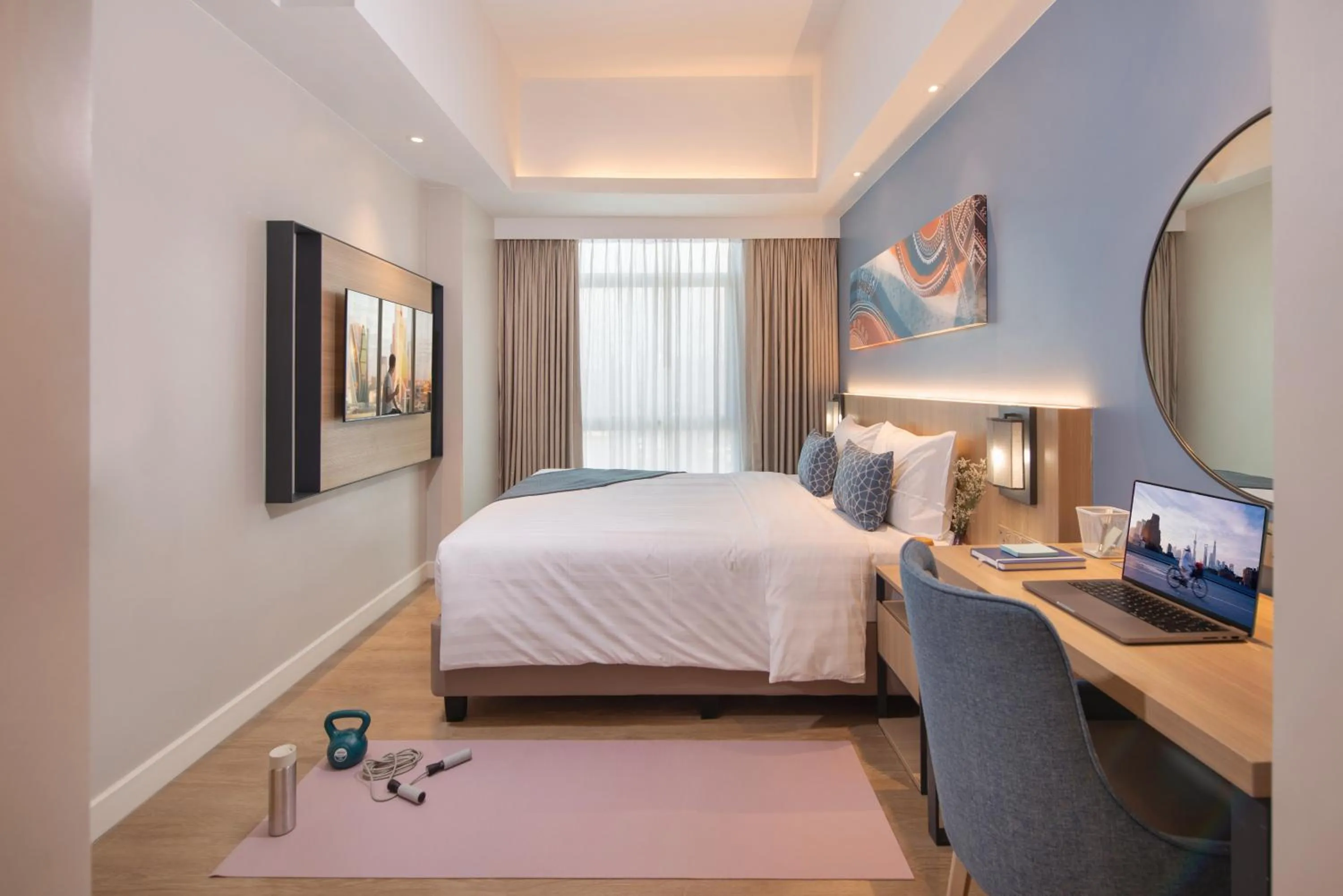 Bed in Citadines Roces Quezon City