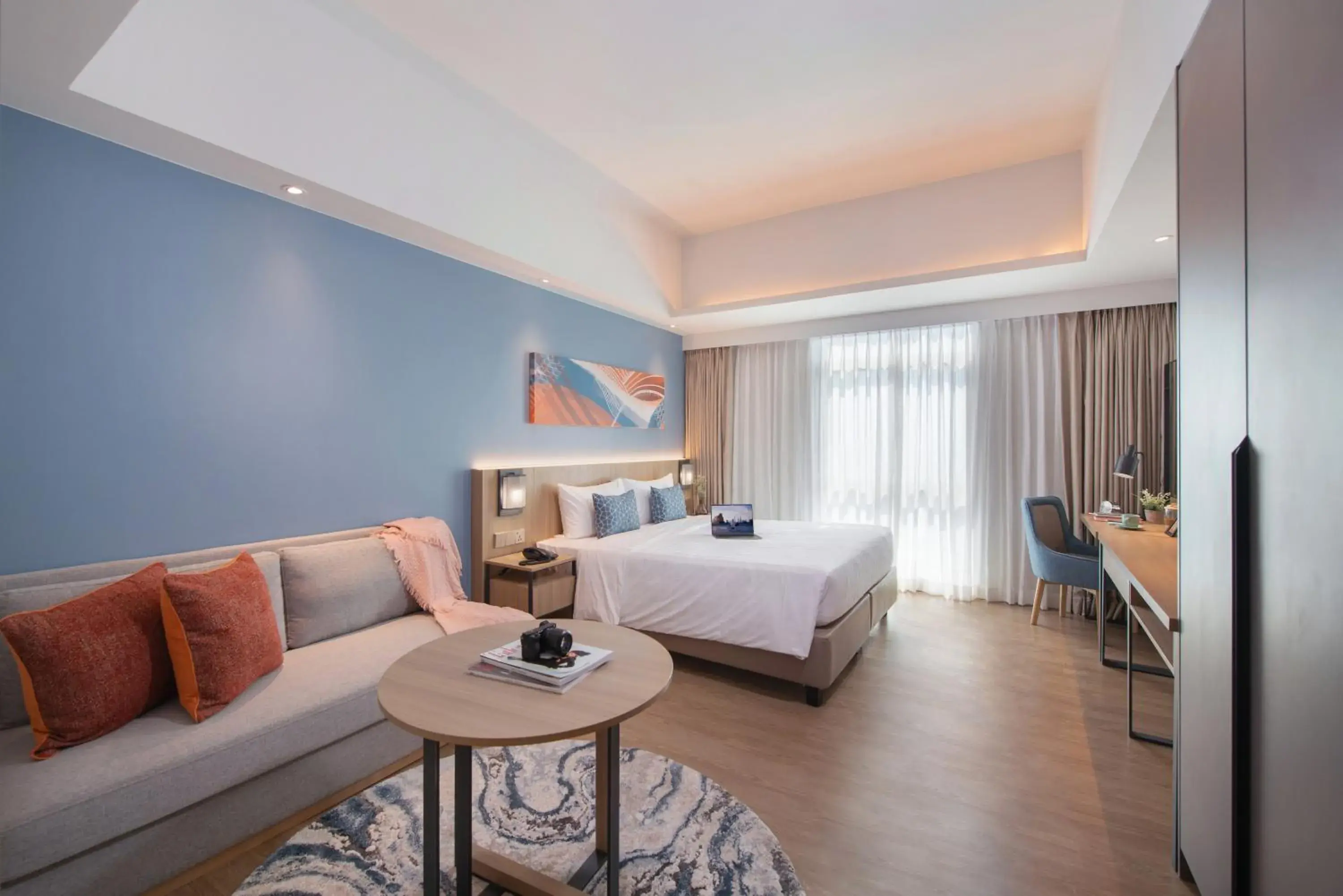 Seating area, Bed in Citadines Roces Quezon City Seating area, Bed in Citadines Roces Quezon City