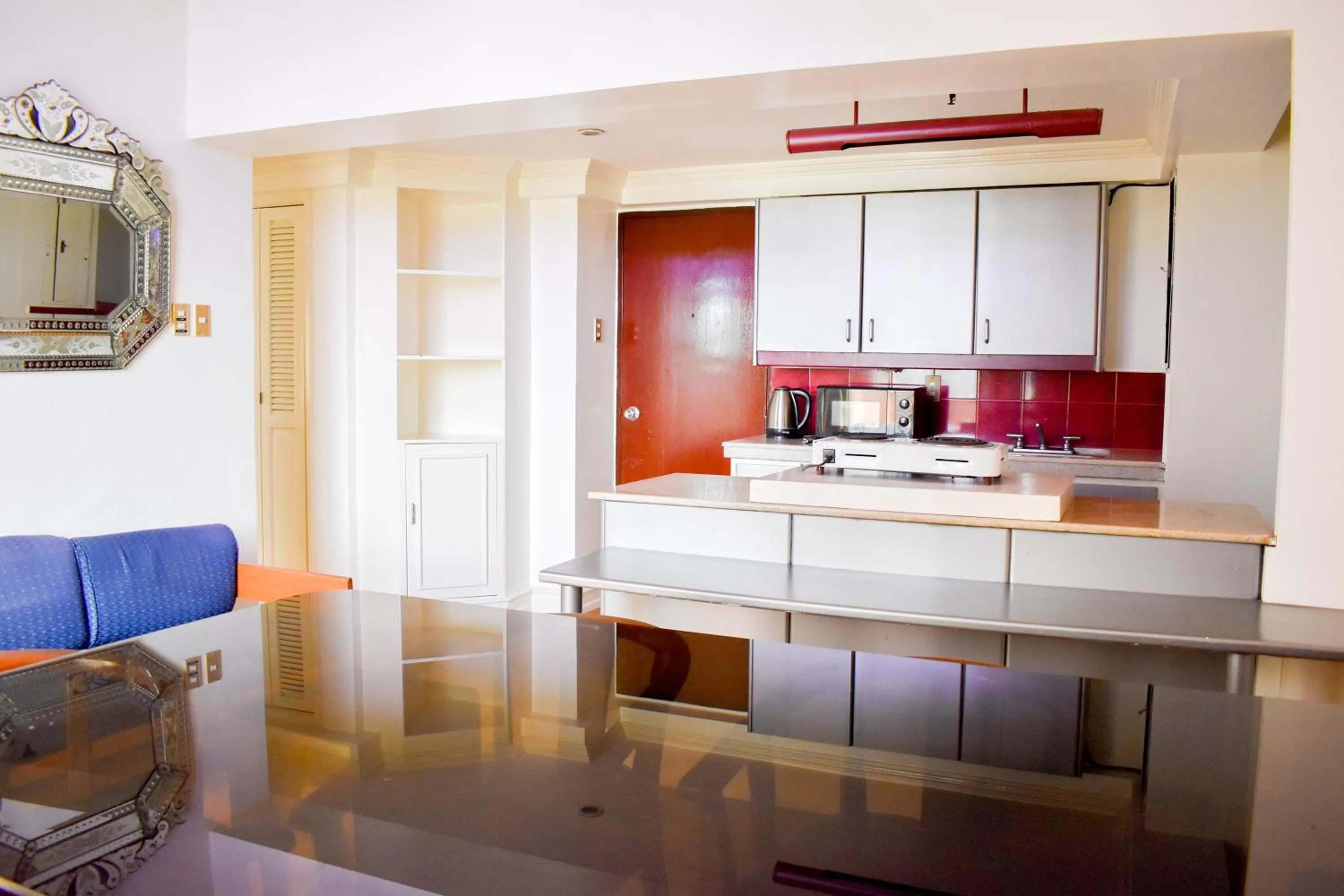 Kitchen or kitchenette in Sunette Tower Suites Makati City Center