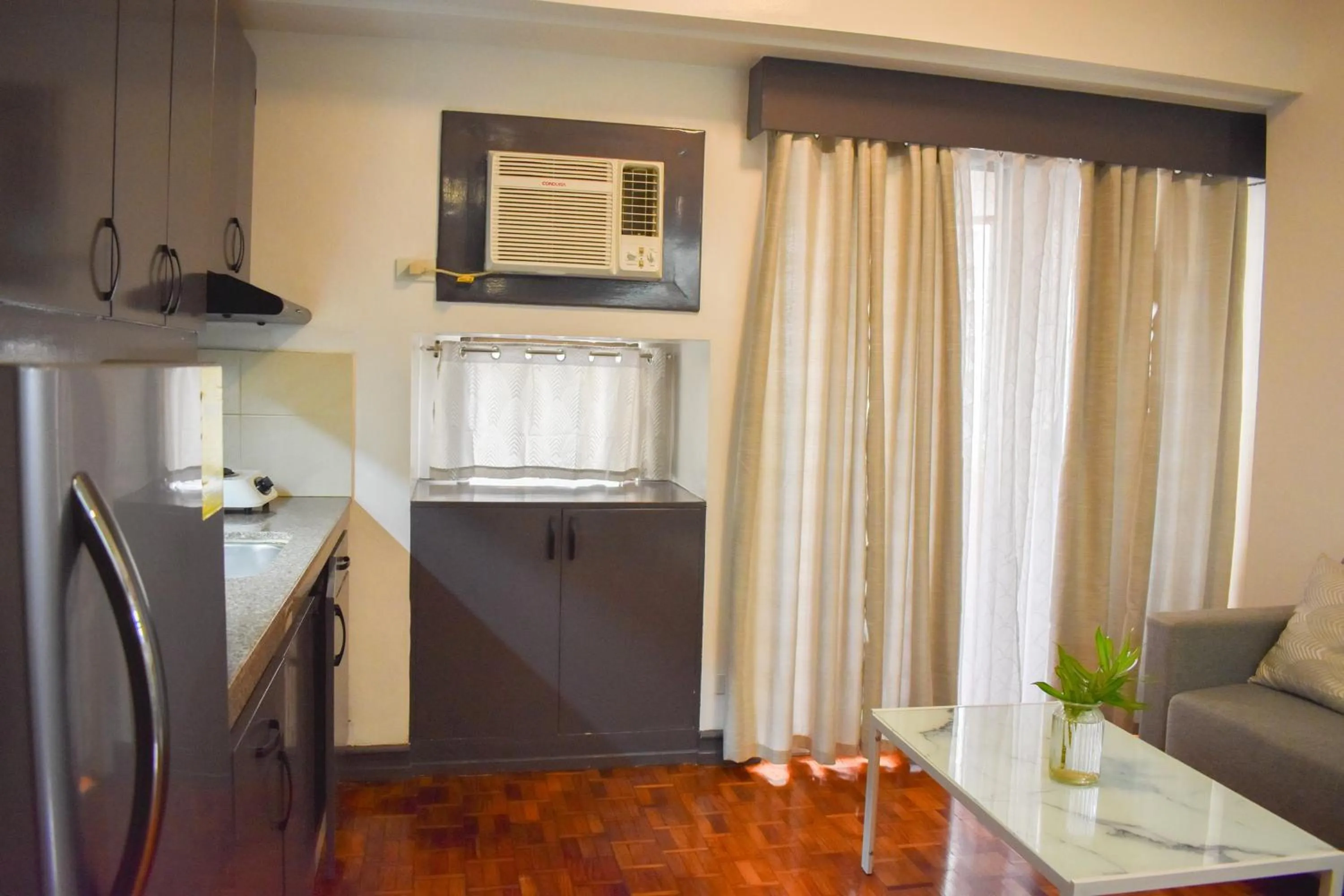 Kitchen or kitchenette in Sunette Tower Suites Makati City Center