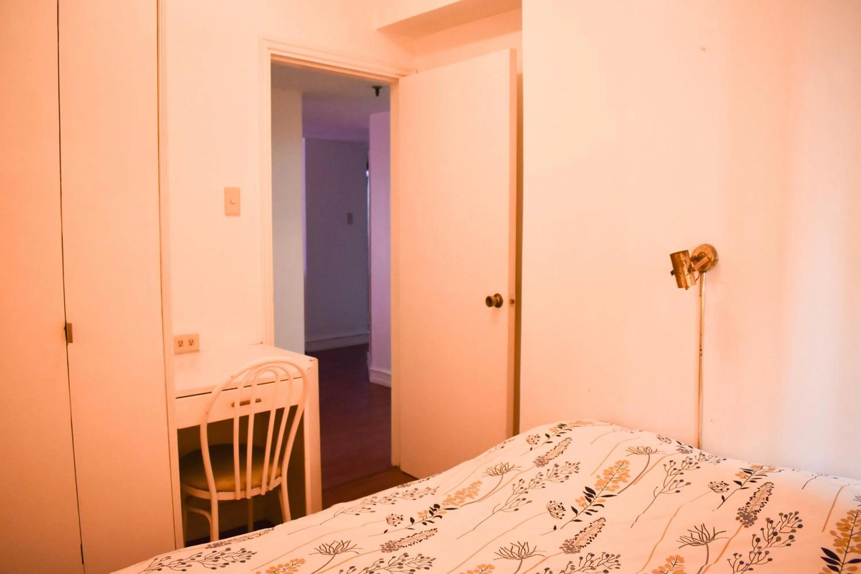 Bed in Sunette Tower Suites Makati City Center