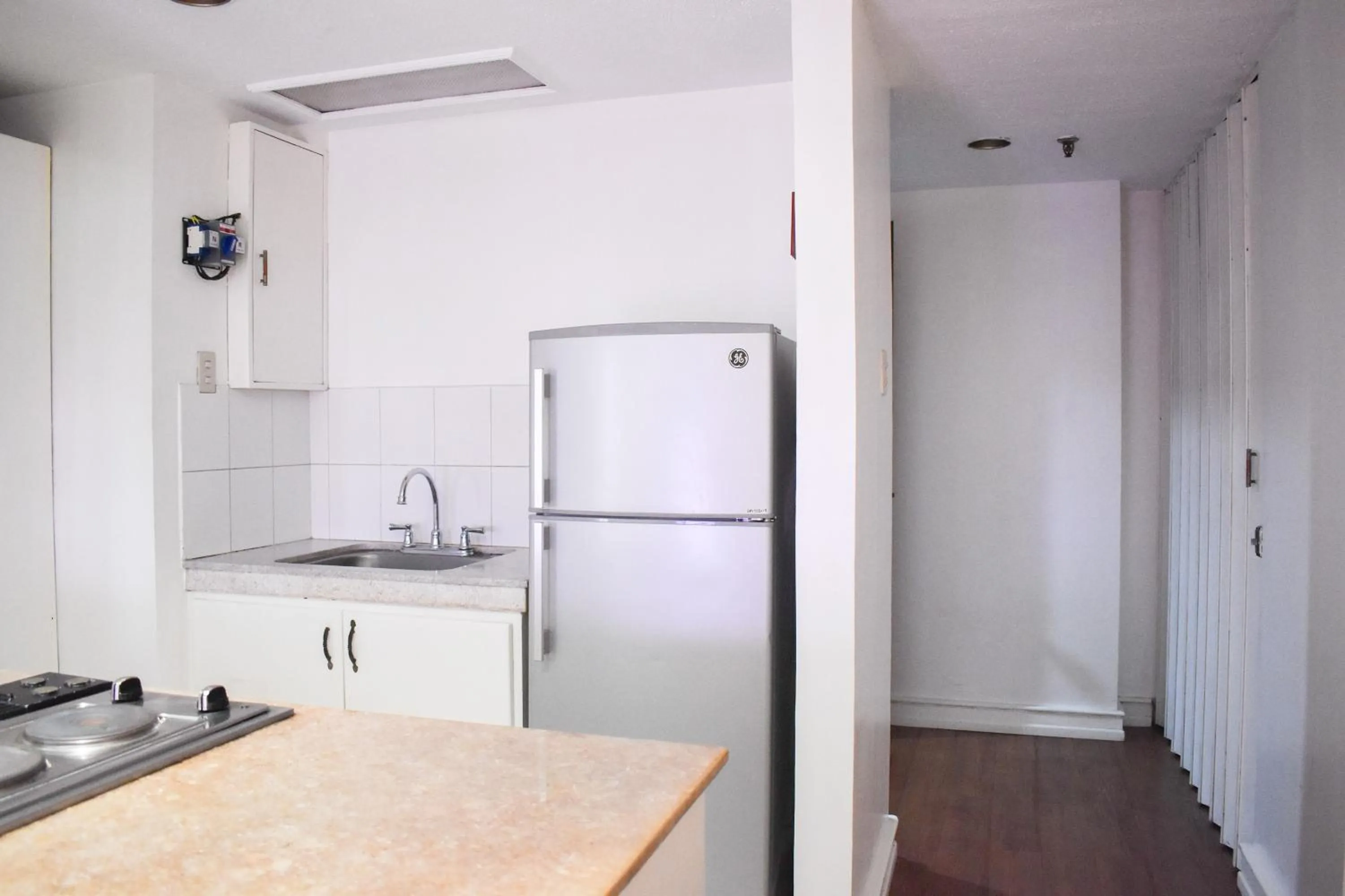 Kitchen or kitchenette in Sunette Tower Suites Makati City Center