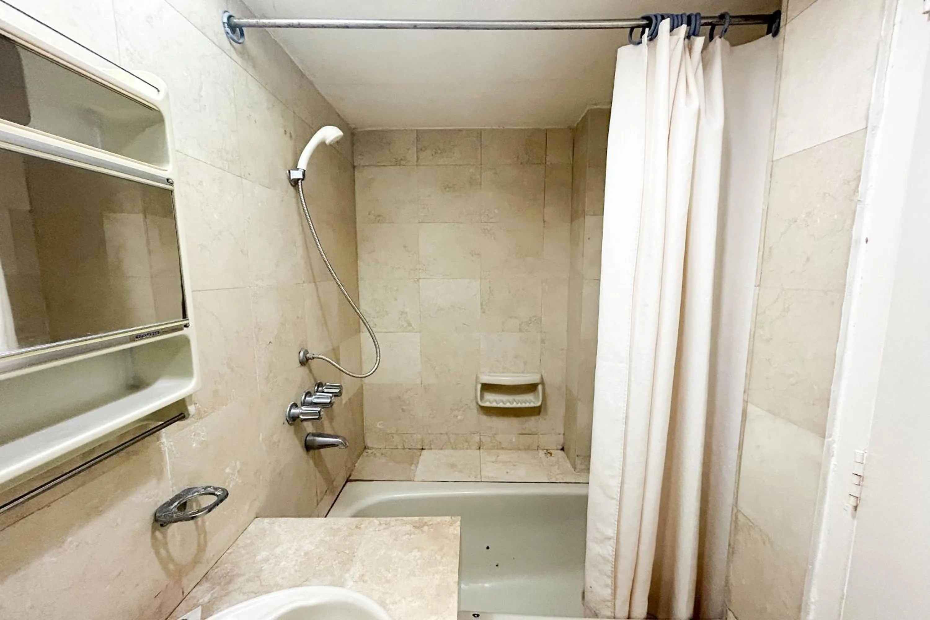 Shower in Sunette Tower Suites Makati City Center