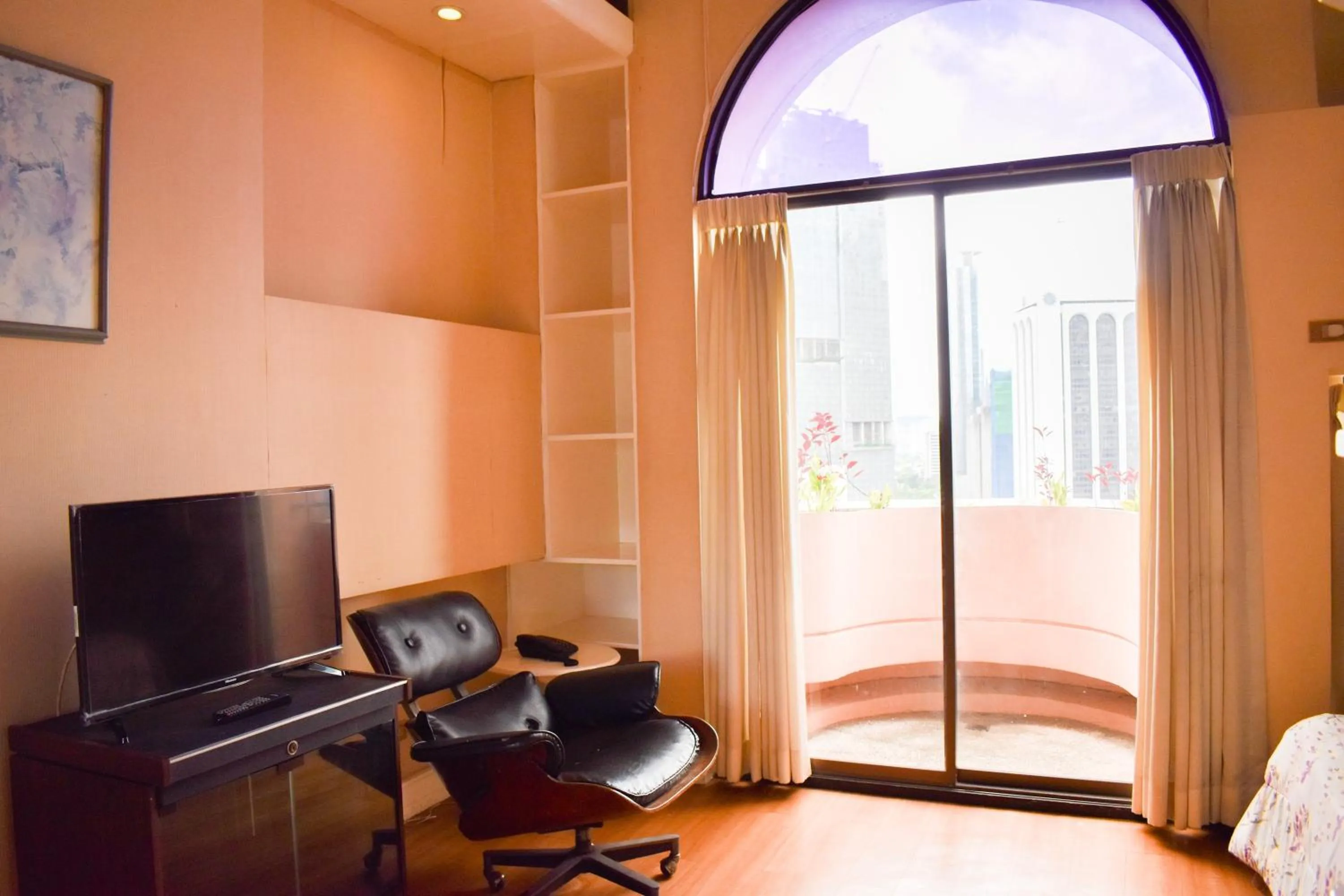 Bed in Sunette Tower Suites Makati City Center