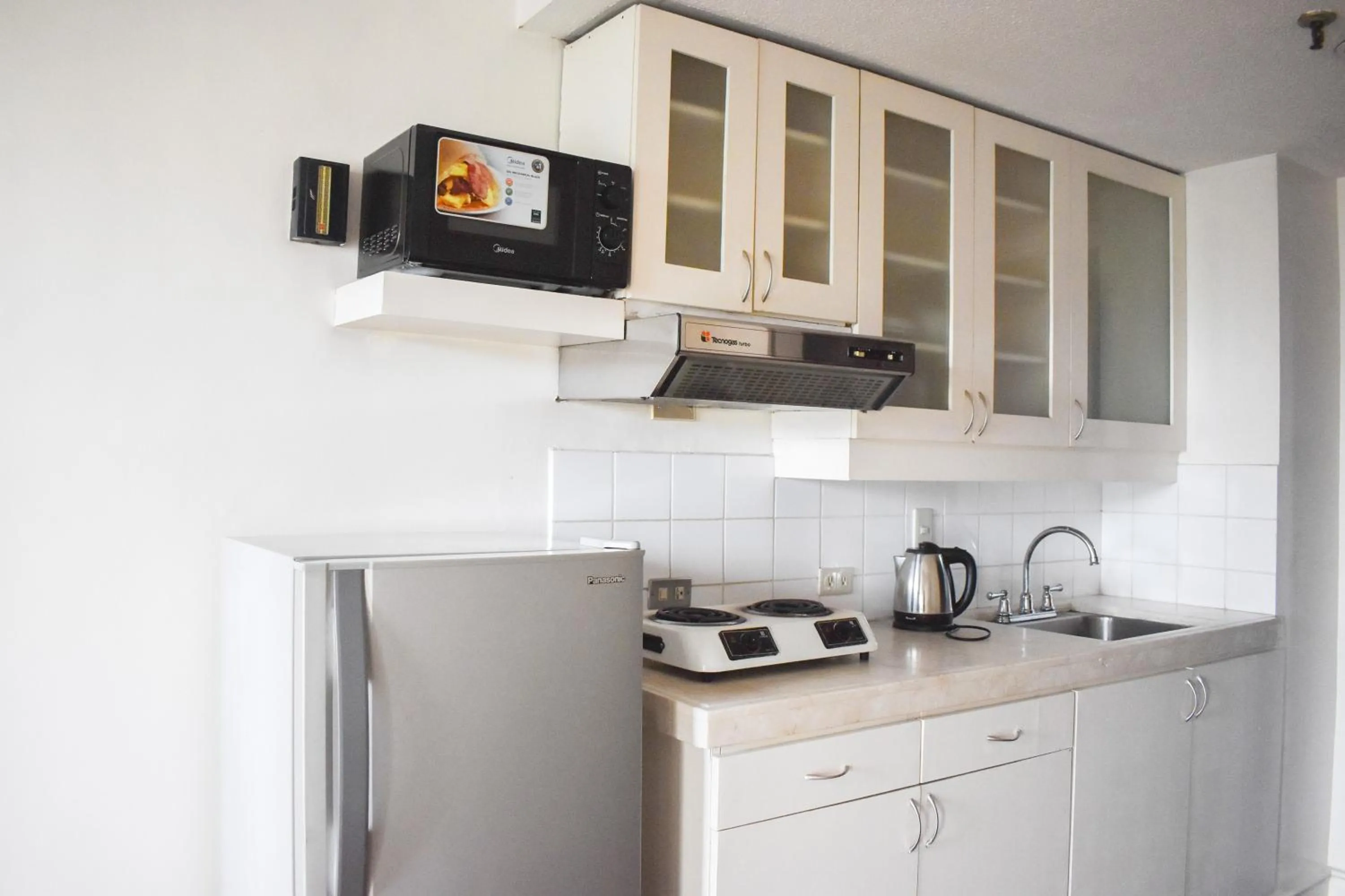Kitchen or kitchenette in Sunette Tower Suites Makati City Center