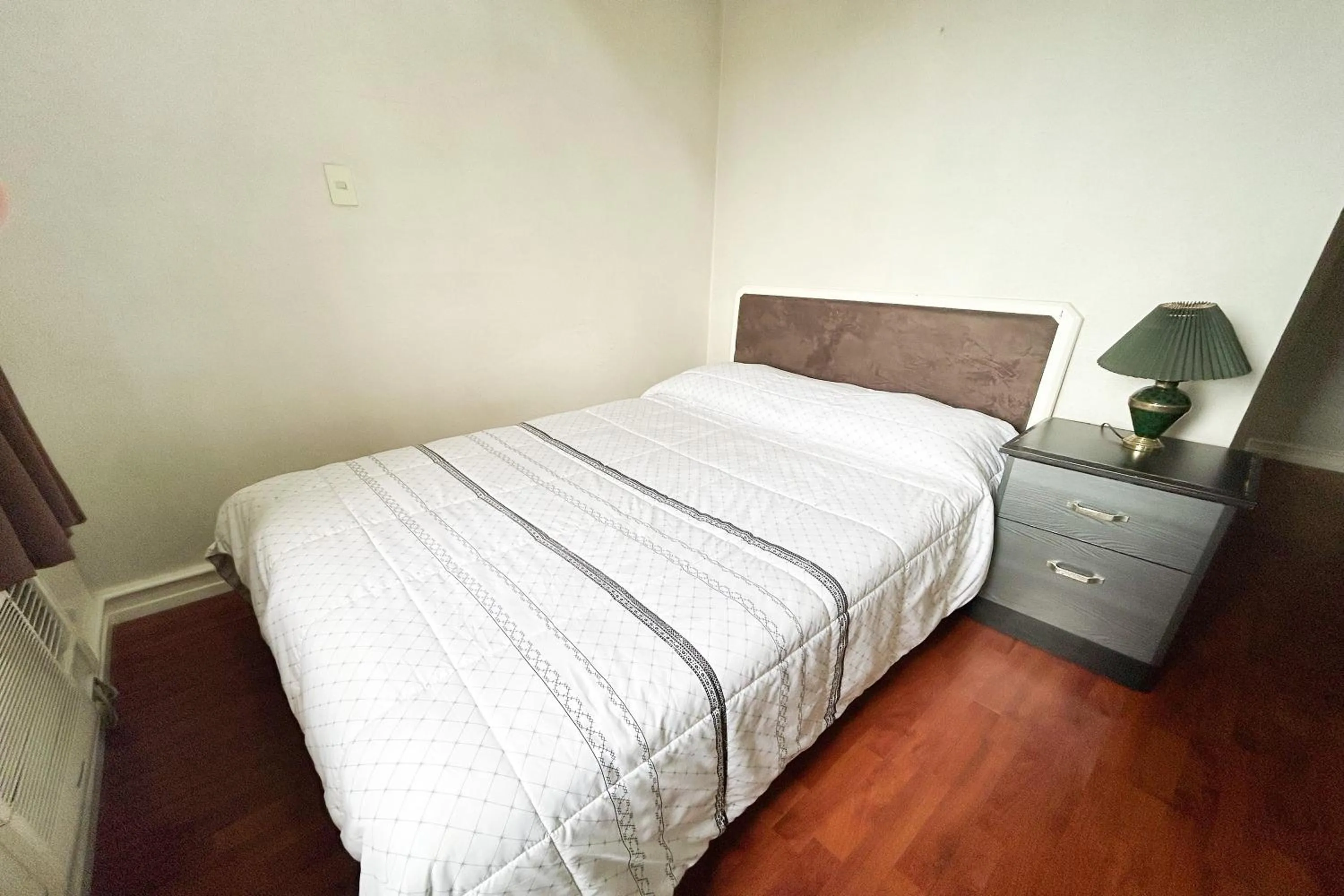 Bed in Sunette Tower Suites Makati City Center