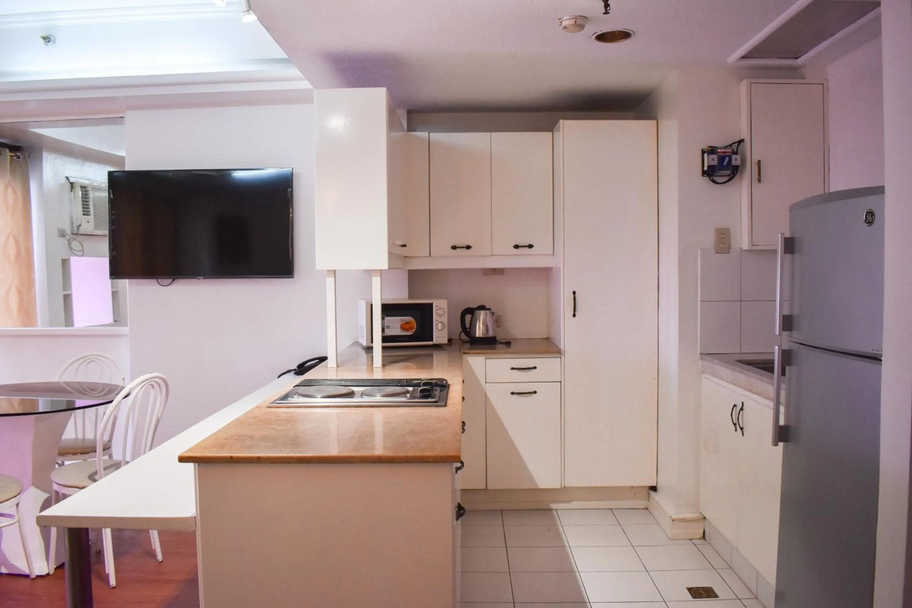 Kitchen or kitchenette in Sunette Tower Suites Makati City Center