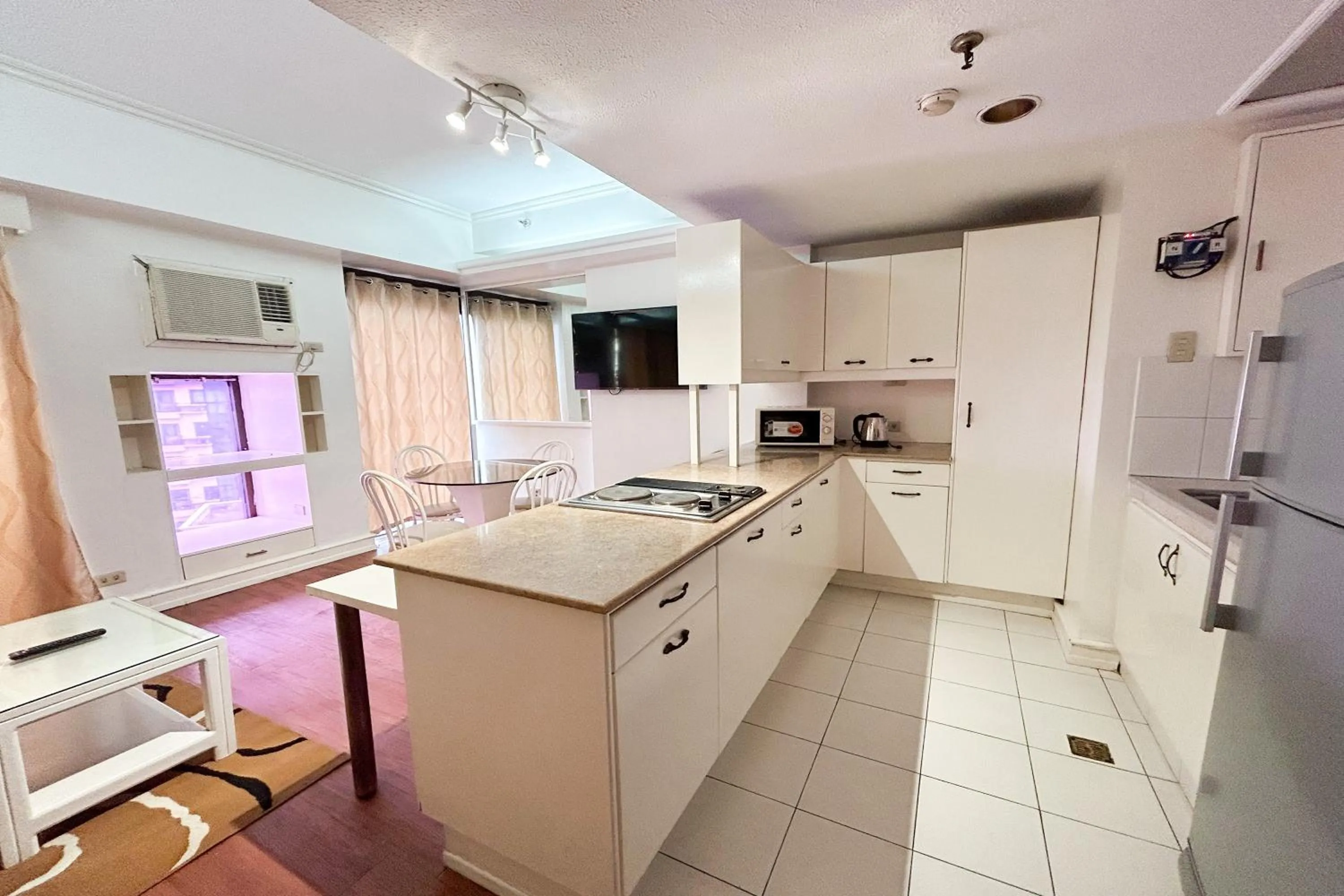 Kitchen or kitchenette in Sunette Tower Suites Makati City Center
