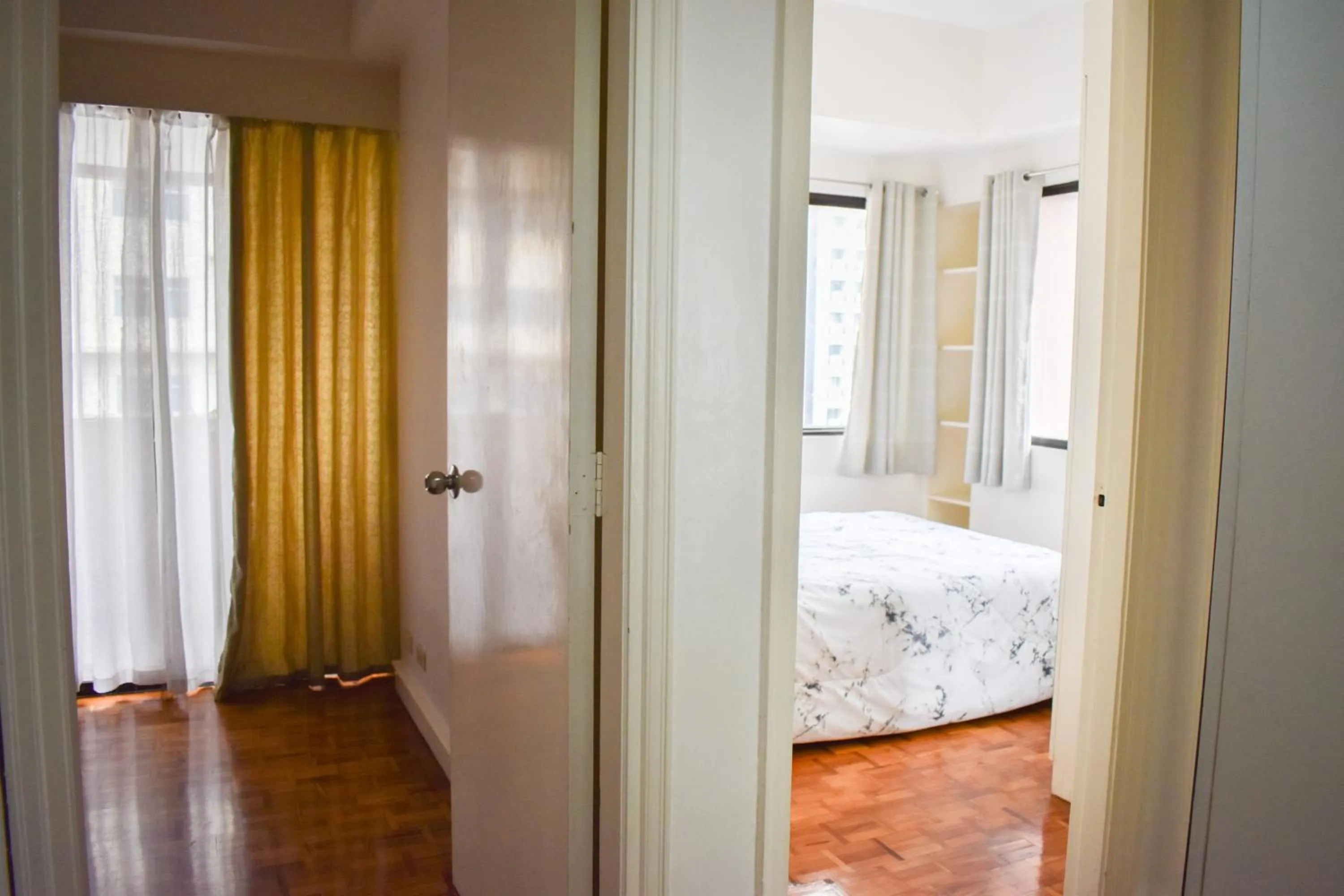 Bed in Sunette Tower Suites Makati City Center