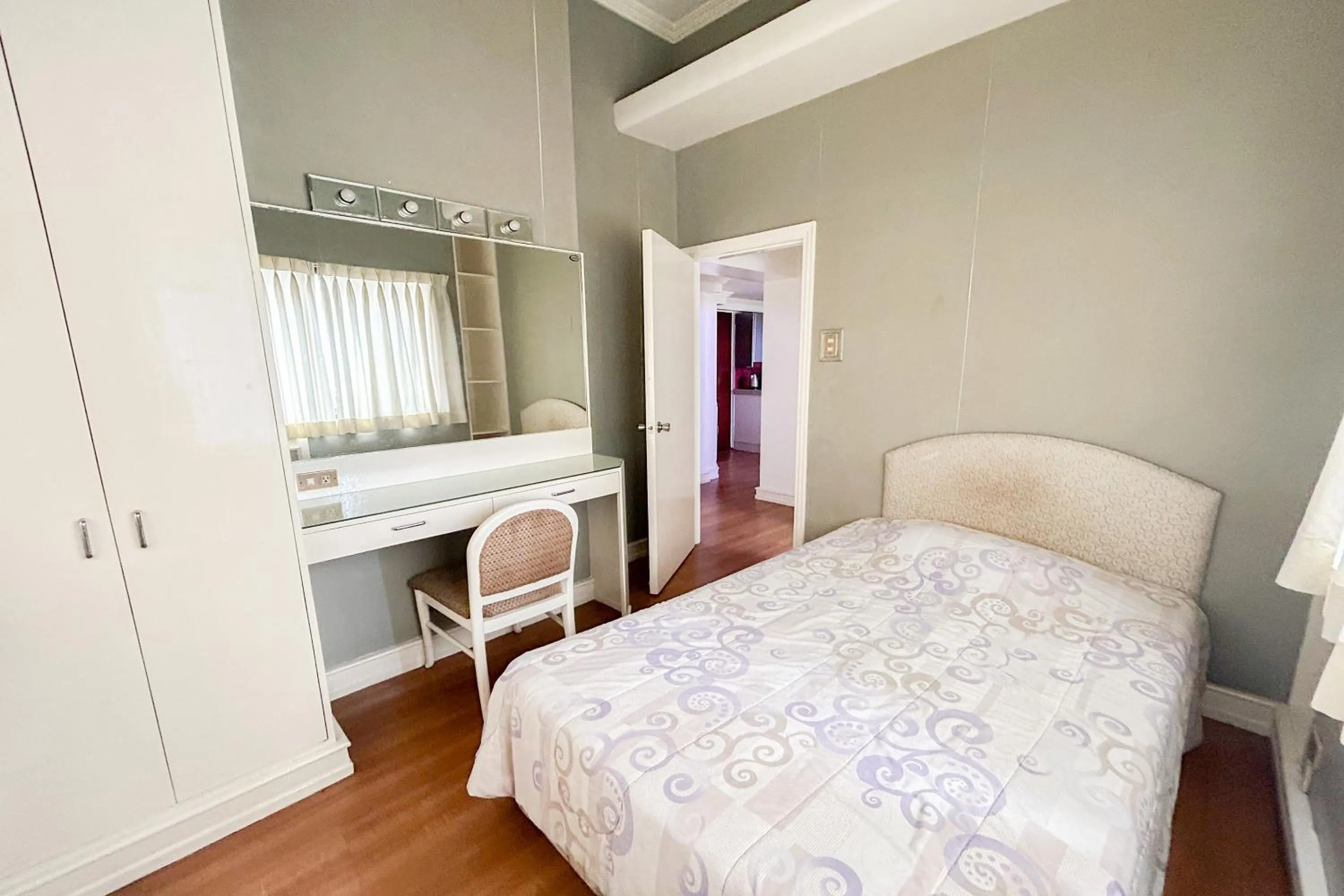 Bed in Sunette Tower Suites Makati City Center