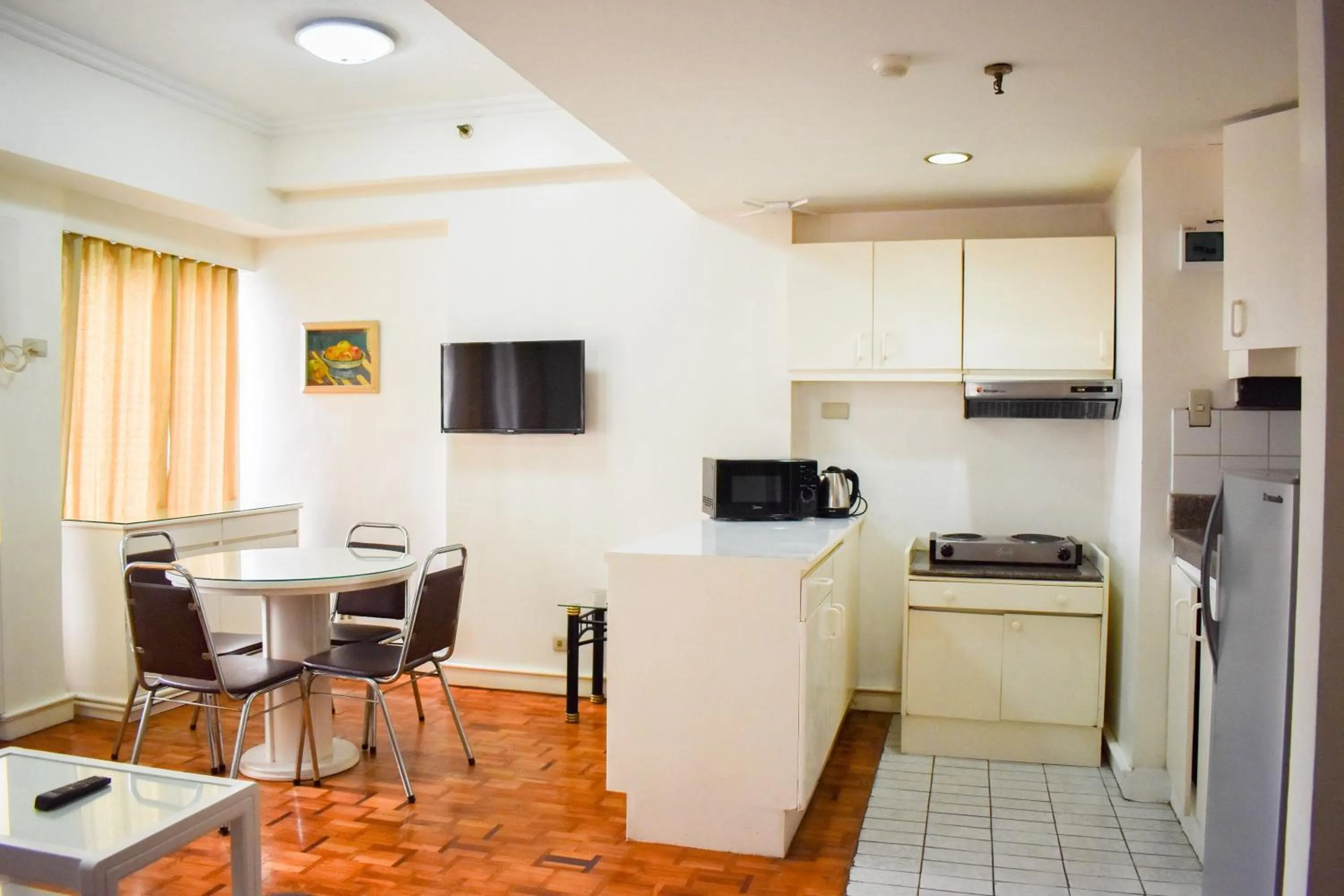 Kitchen or kitchenette in Sunette Tower Suites Makati City Center