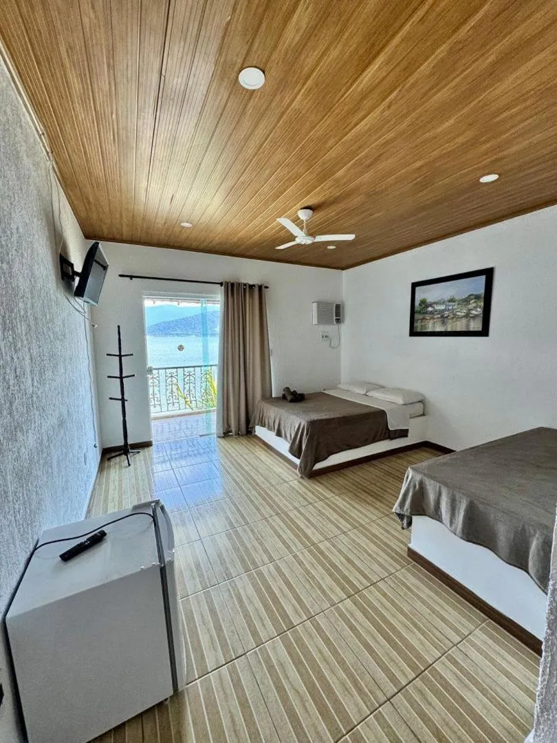 Bed in Pousada da Praia