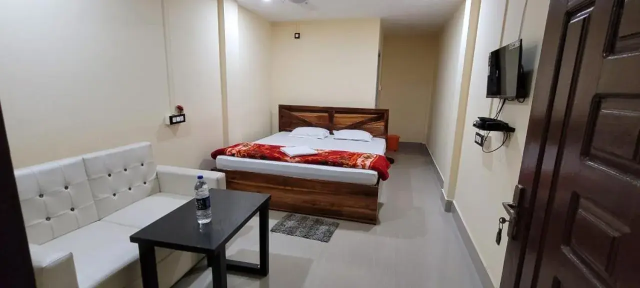 TV and multimedia, Bed in The Western Lodge TV and multimedia, Bed in The Western Lodge