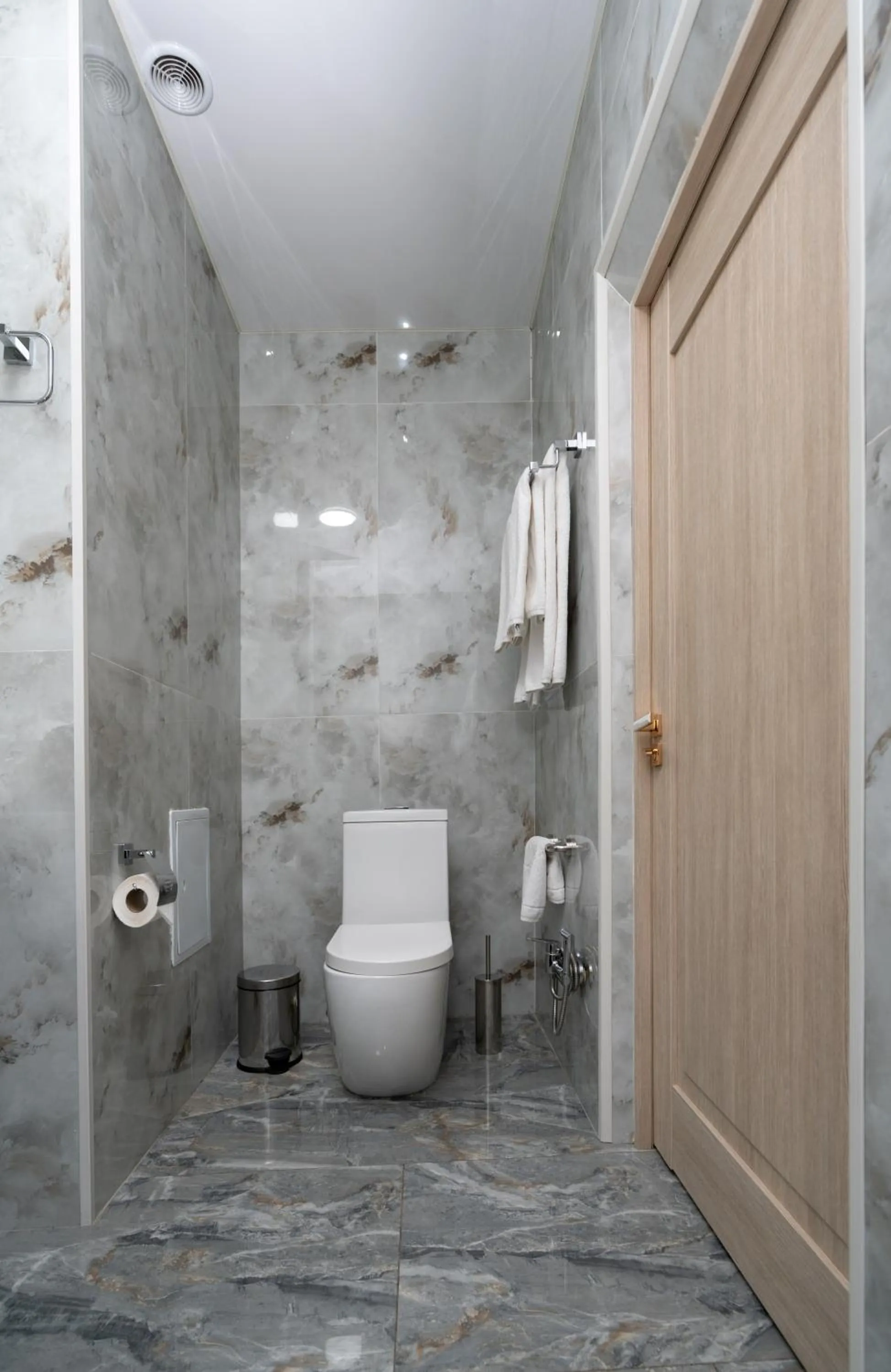 Toilet in The Tower Hotel Tashkent by HotelPro Group