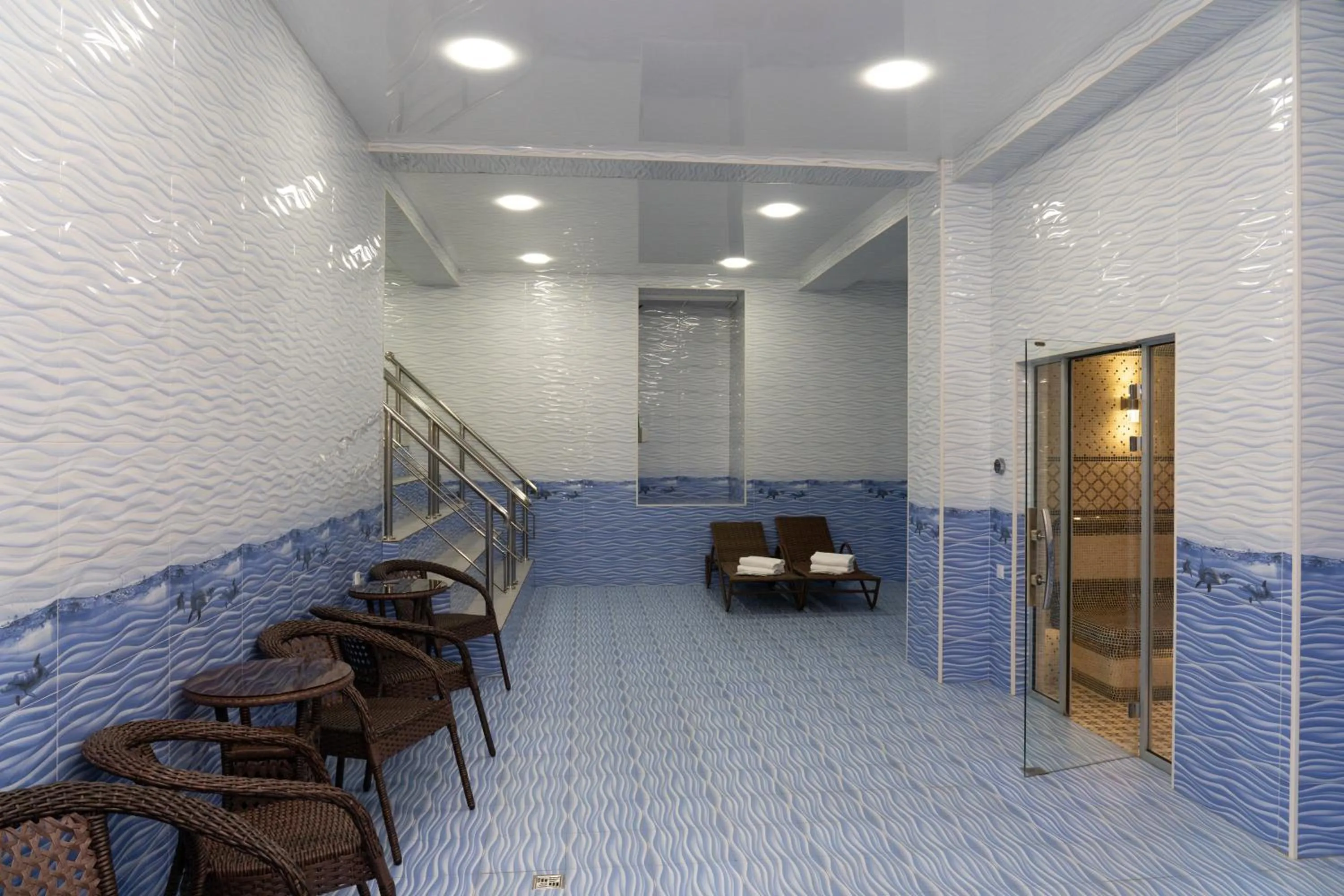 Swimming pool in The Tower Hotel Tashkent by HotelPro Group