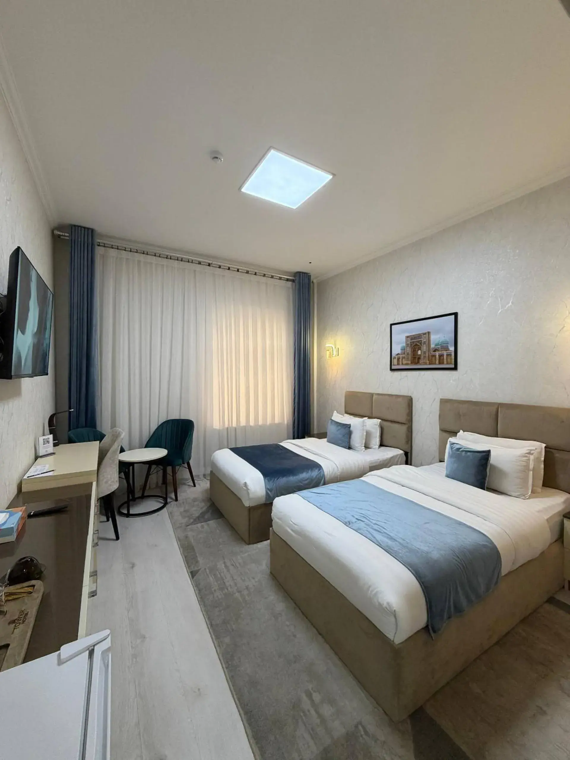 Bed in The Tower Hotel Tashkent by HotelPro Group Bed in The Tower Hotel Tashkent by HotelPro Group