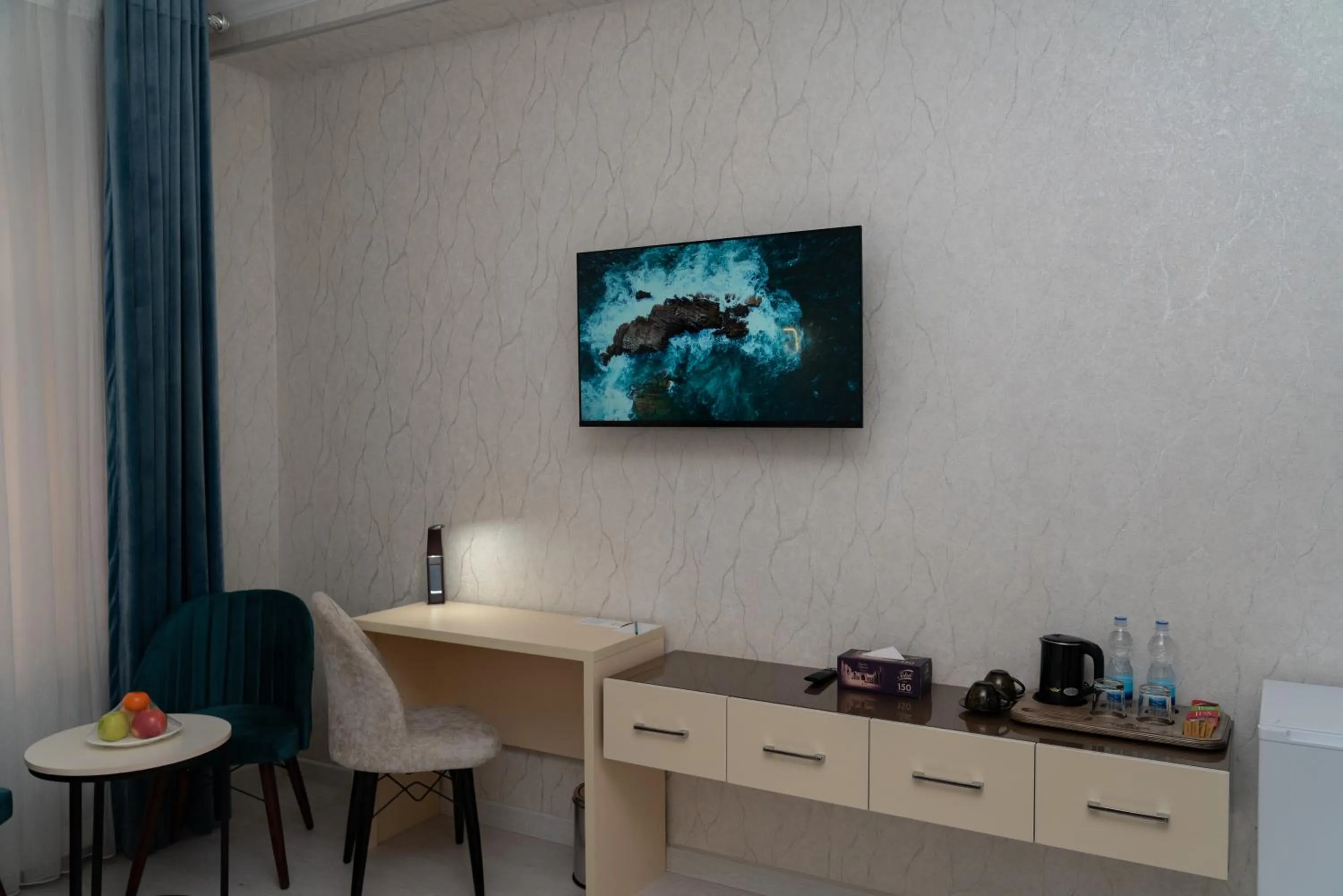 TV and multimedia in The Tower Hotel Tashkent by HotelPro Group