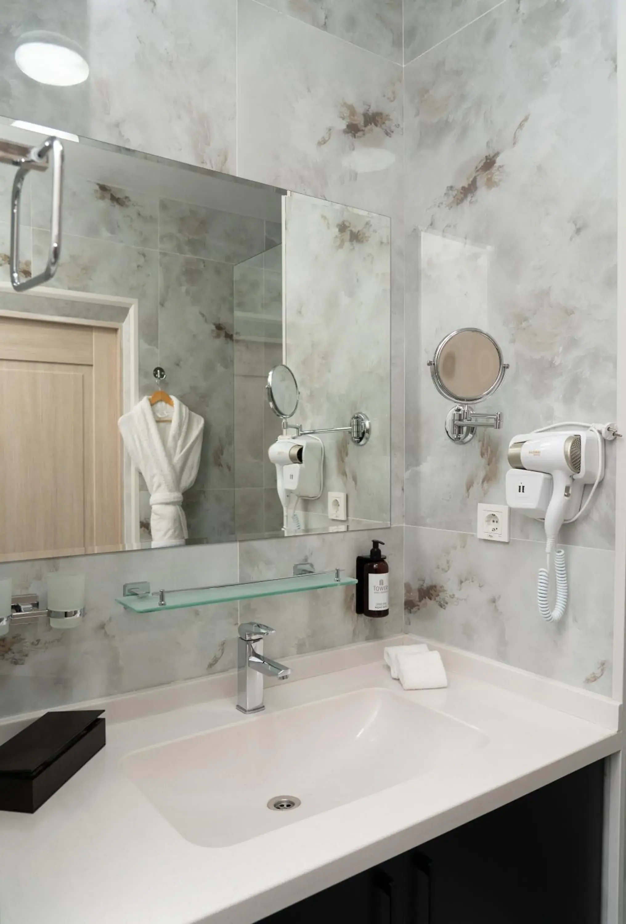 Bathroom in The Tower Hotel Tashkent by HotelPro Group Bathroom in The Tower Hotel Tashkent by HotelPro Group